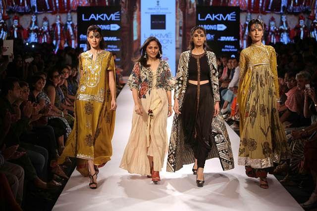 green emerald velvet dress India Fashion Week Blossoms in More Ways Than One main image 0