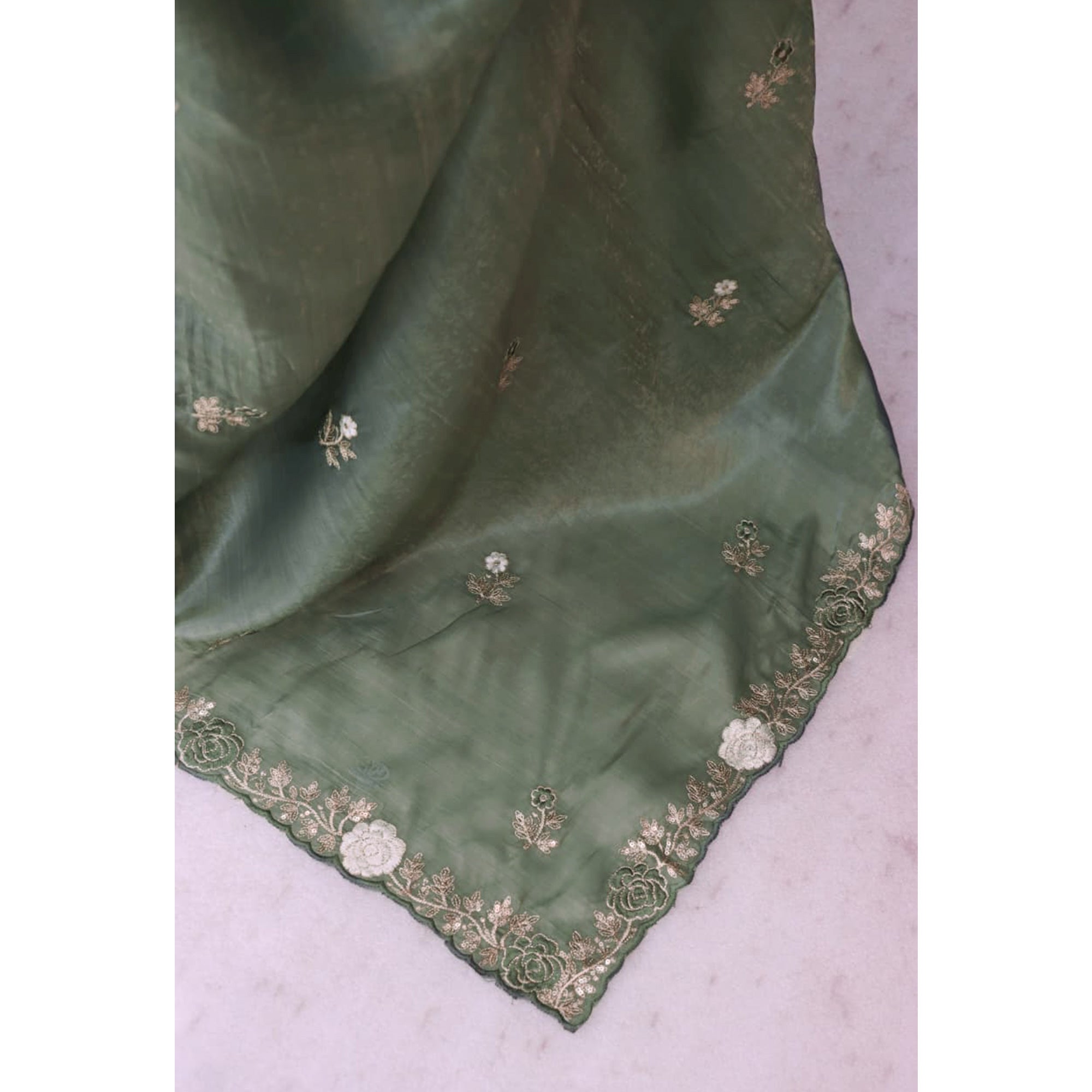 Green Lightweight Georgette Crush Saree Adorned with Delicate Floral Embroidery