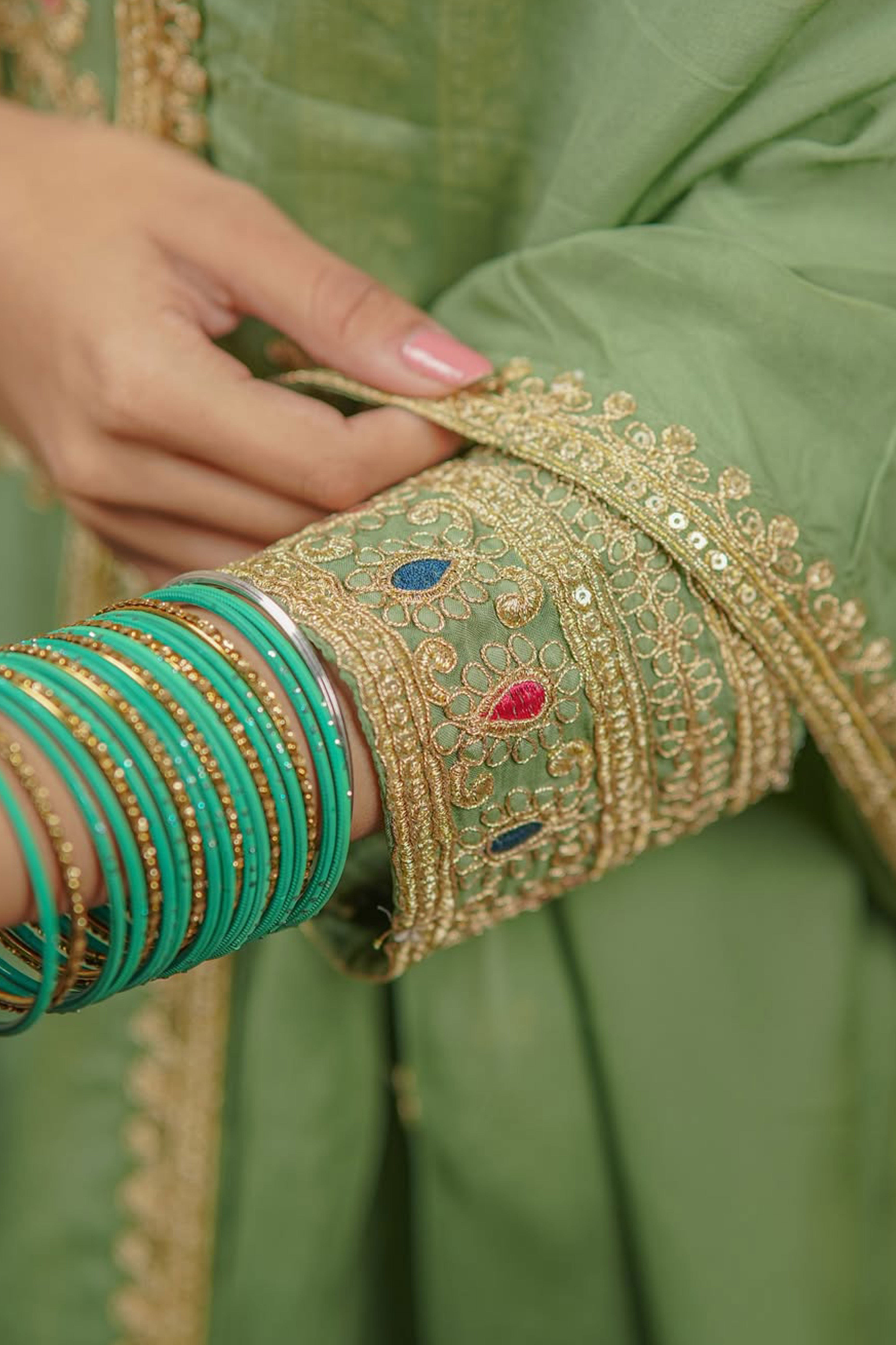 Green Organza Suit Accented with Thread & Sequins Work