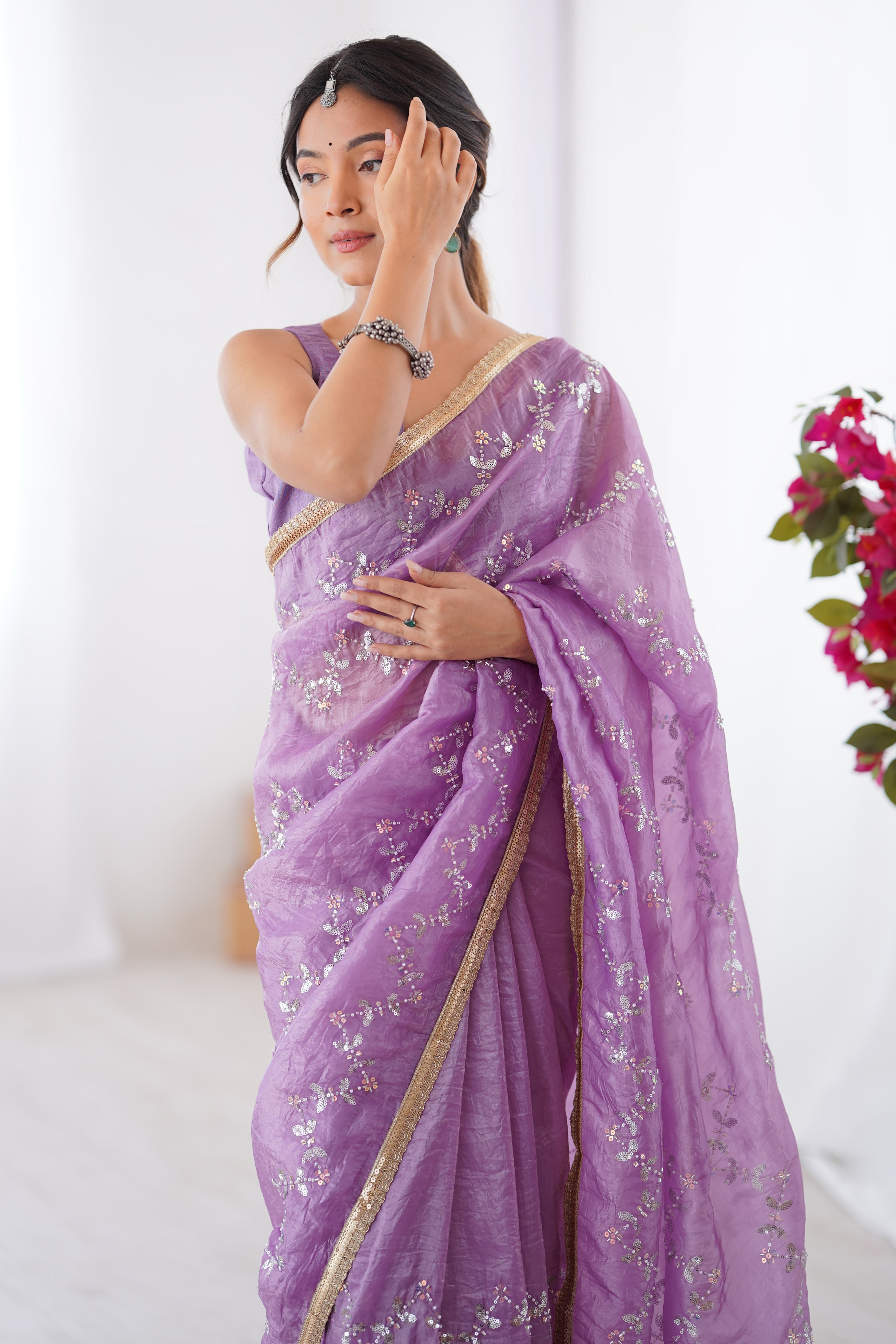 Dazzling Lavender Organza Saree Accented with Sequin, Bead & Stone Work and Delicate Lace Detailing