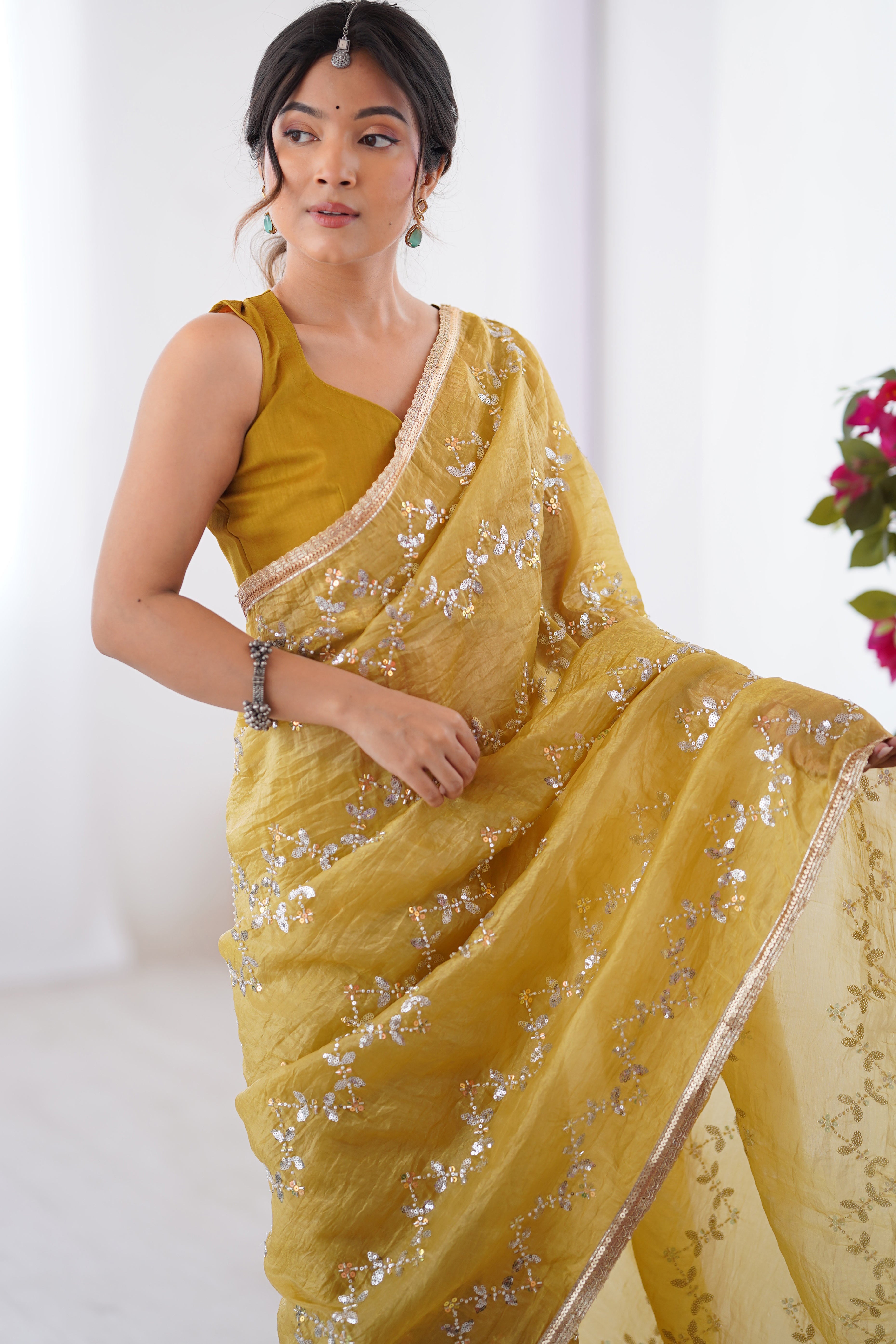 Dazzling Mustard Yellow Organza Saree Accented with Sequin, Bead & Stone Work and Delicate Lace Detailing