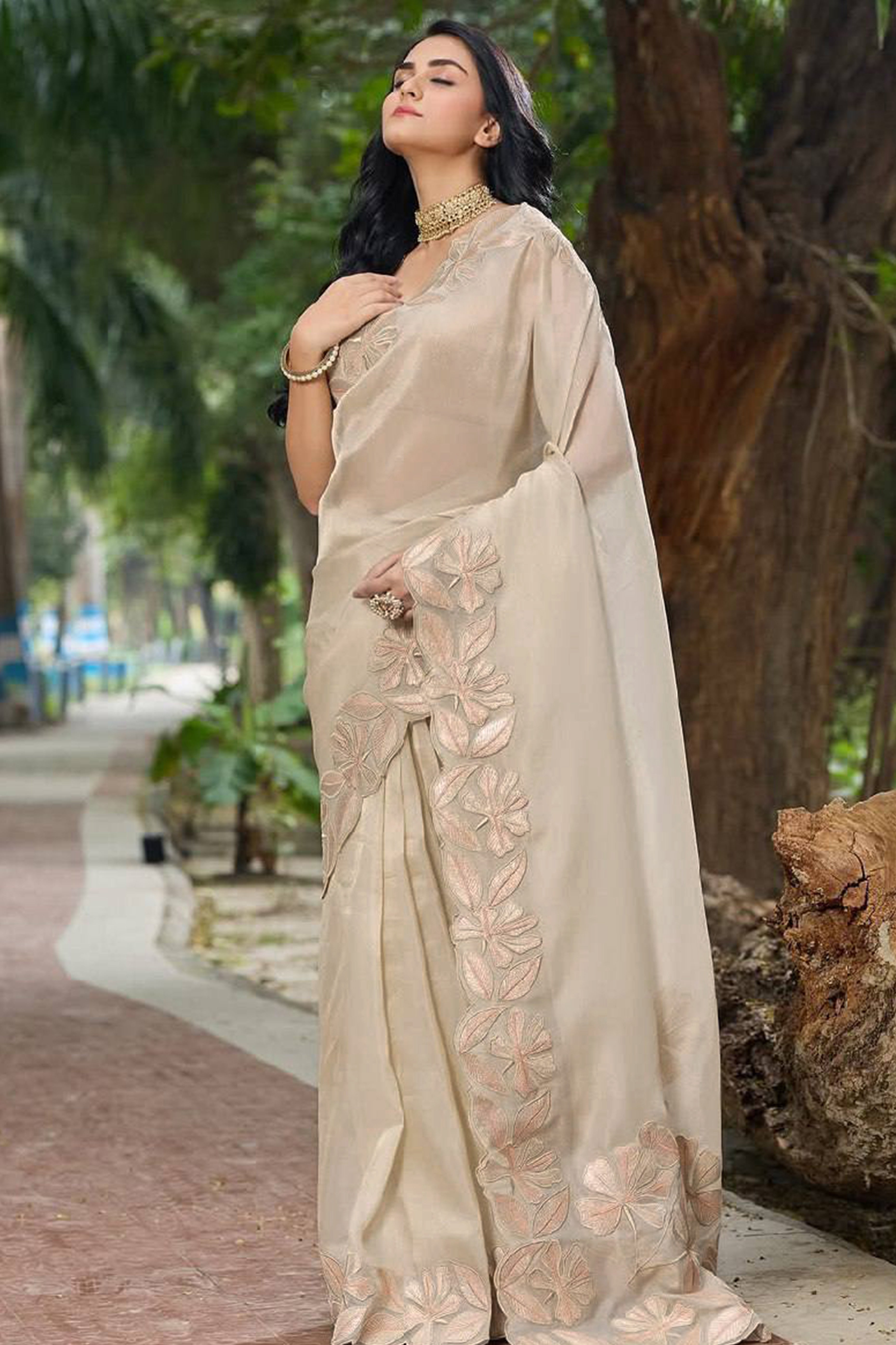 Sophisticated Beige Organza Silk Saree Beautified With Intricate Floral Embroidery & Sequins Work