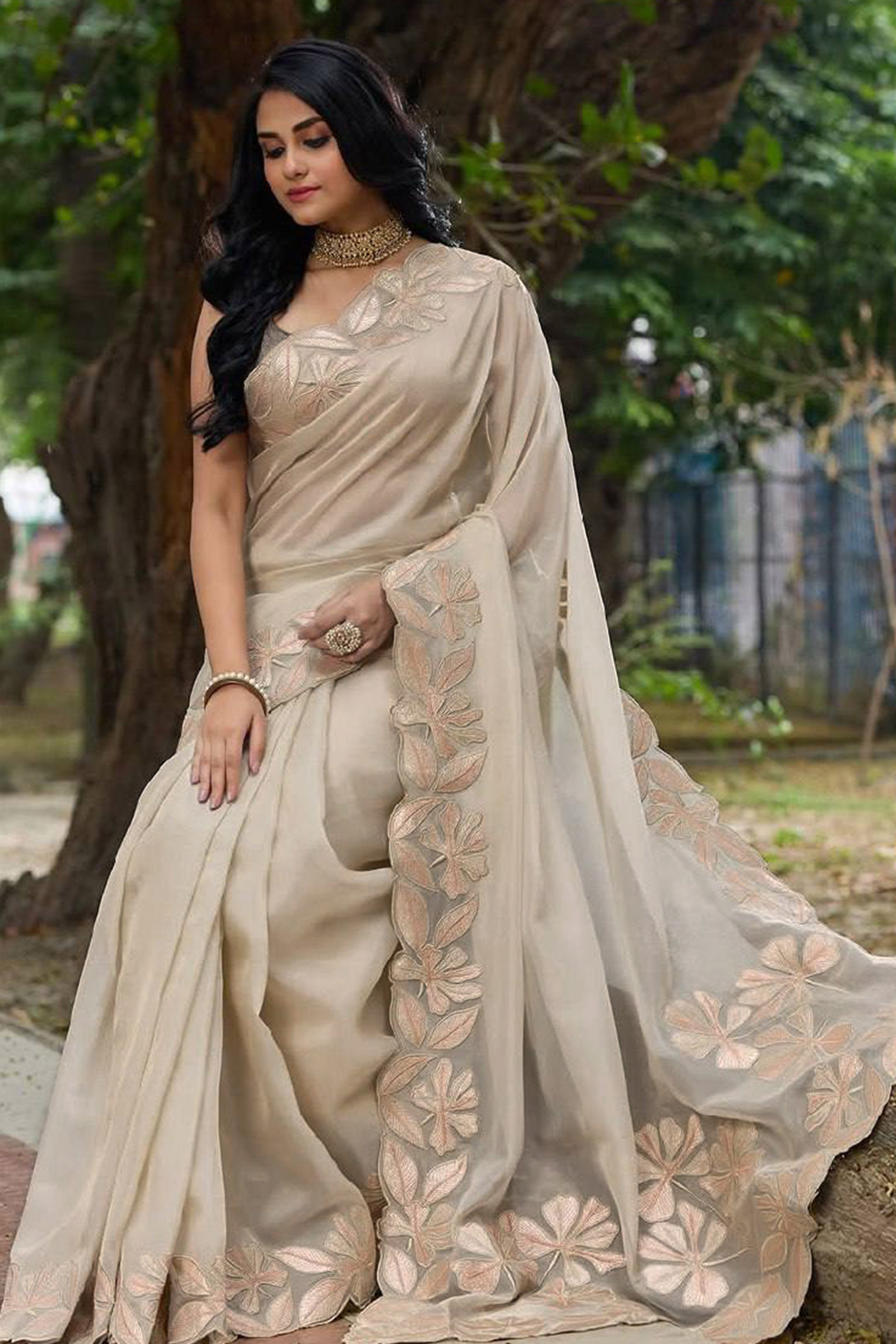 Sophisticated Beige Organza Silk Saree Beautified With Intricate Floral Embroidery & Sequins Work