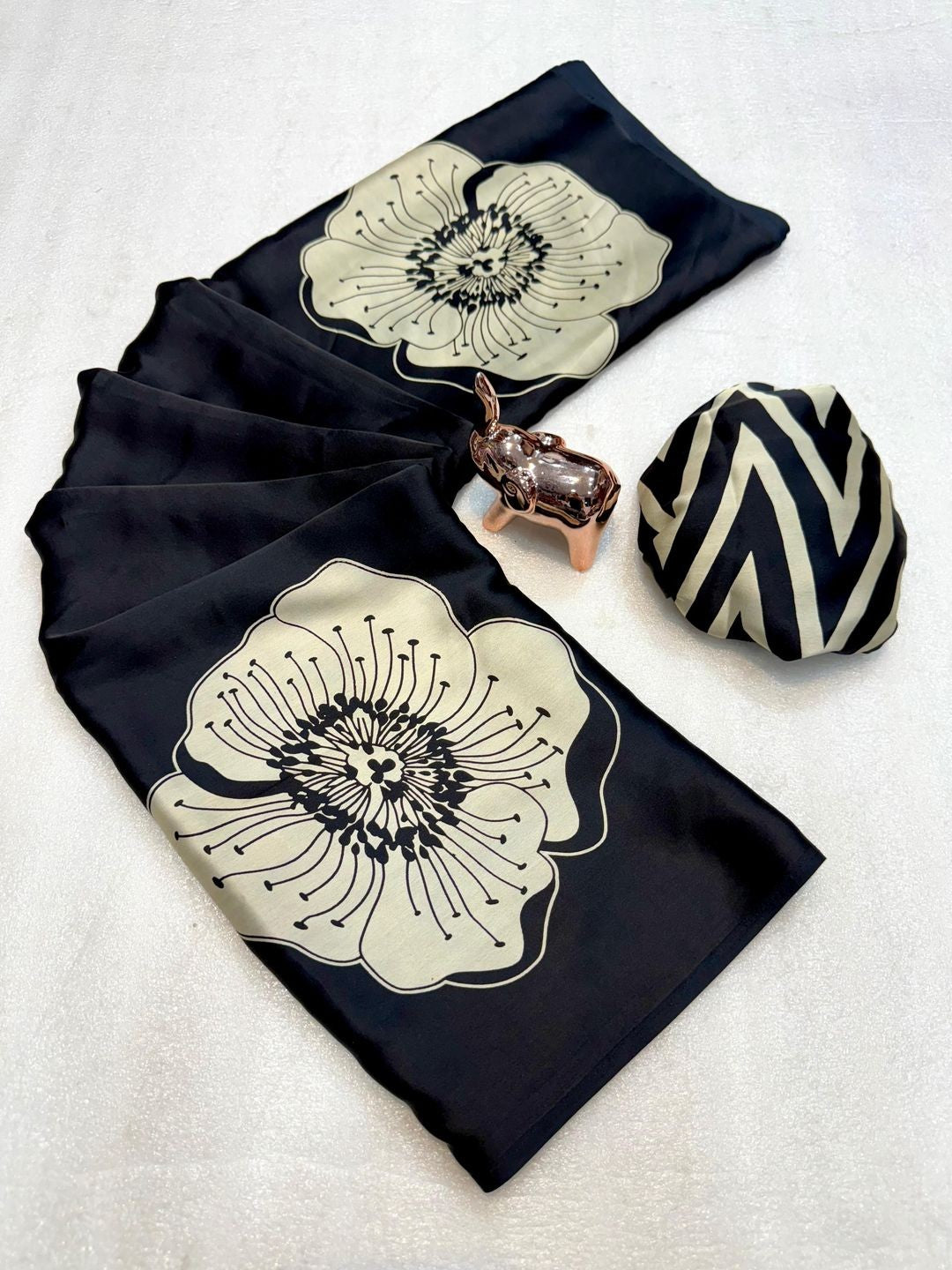 Timeless elegance in this black satin saree adorned with delicate floral prints - Image 2