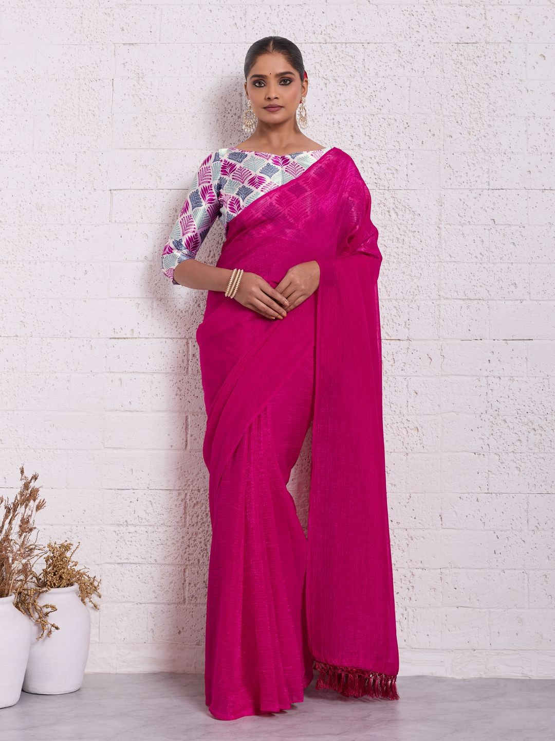 Graceful Pink Solid Pure Crunchy Saree Accented With Fine Tassel Pallu - Image 1