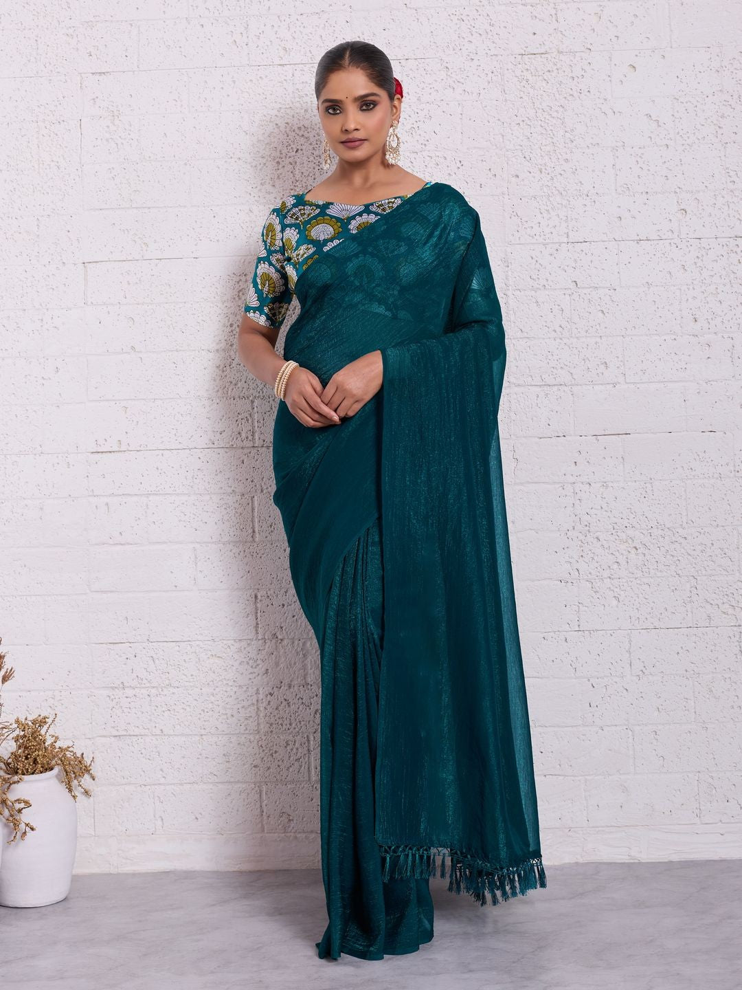Graceful Teal Solid Pure Crunchy Saree Accented With Fine Tassel Pallu - Image 1
