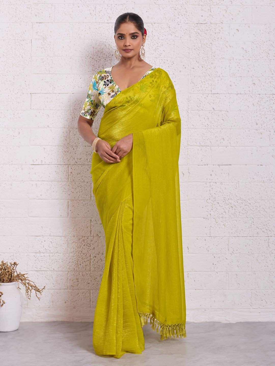 Graceful Lemon Yellow Solid Pure Crunchy Saree Accented With Fine Tassel Pallu - Image 1