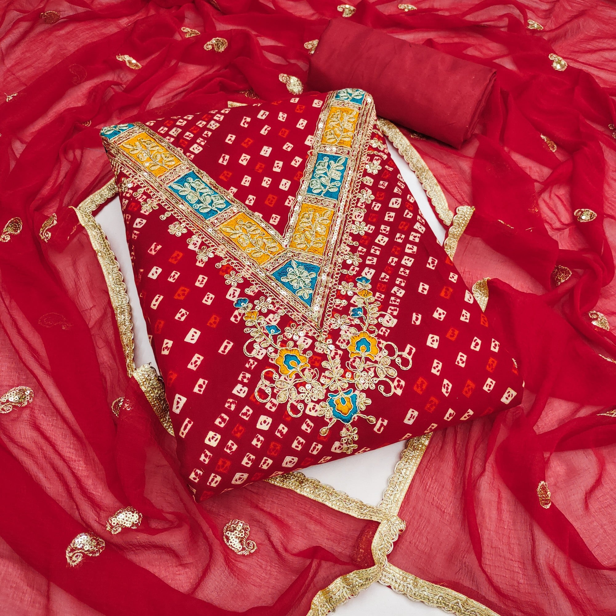 Traditional Red Bandhani Printed Rayon Dress Material Accented With Cording Embroidery Work - Image 1