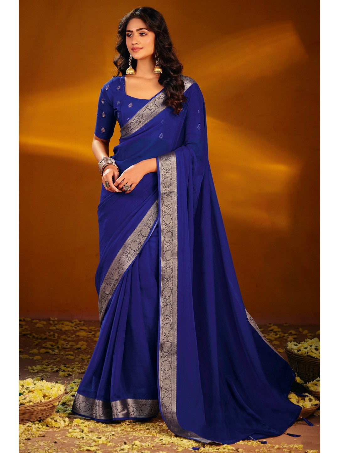 Luxurious Royal Blue Solid Chiffon Saree Enhanced By Floral Weaving Jacquard Border - Image 1