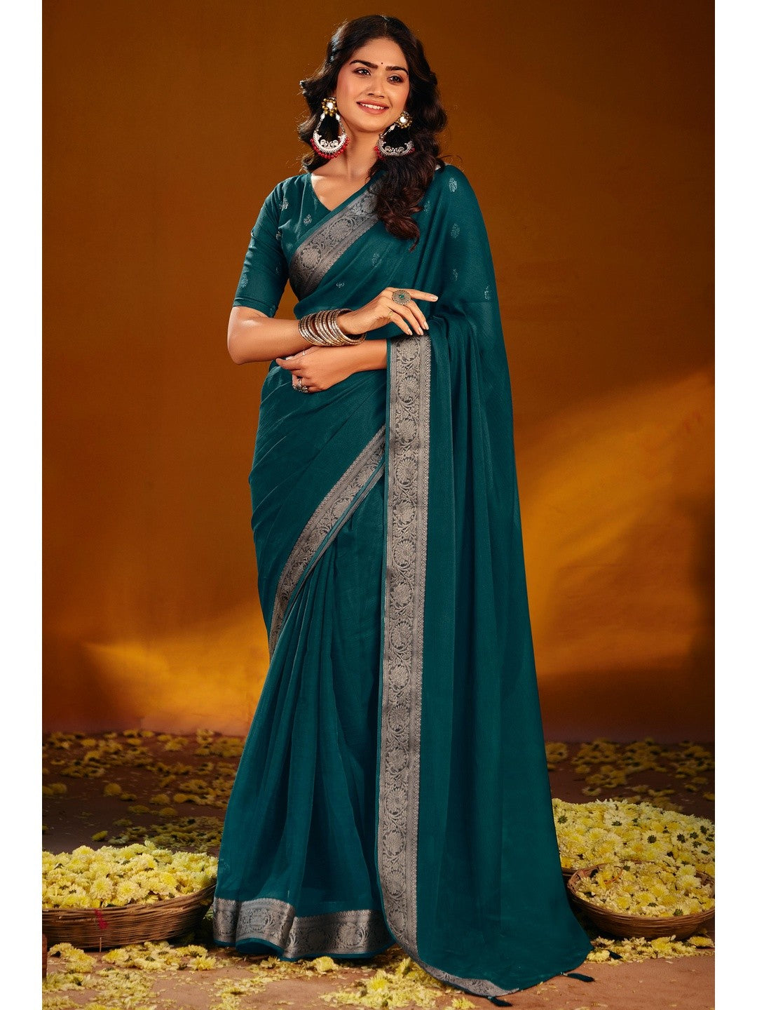Luxurious Teal Solid Chiffon Saree Enhanced By Floral Weaving Jacquard Border - Image 1