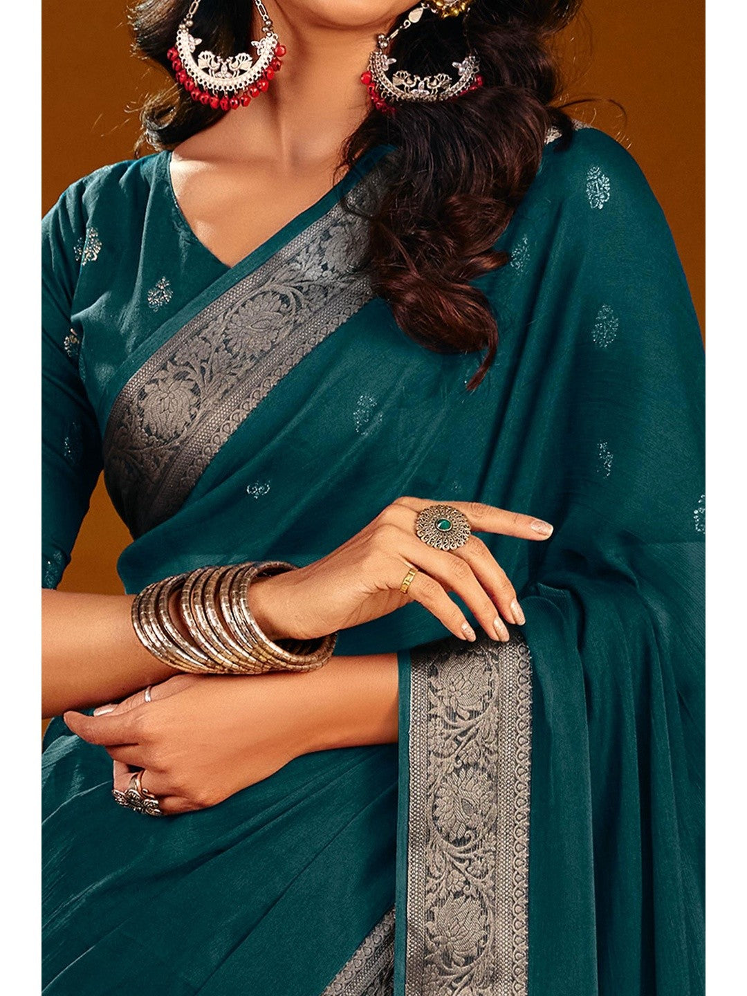 Luxurious Teal Solid Chiffon Saree Enhanced By Floral Weaving Jacquard Border - Image 3