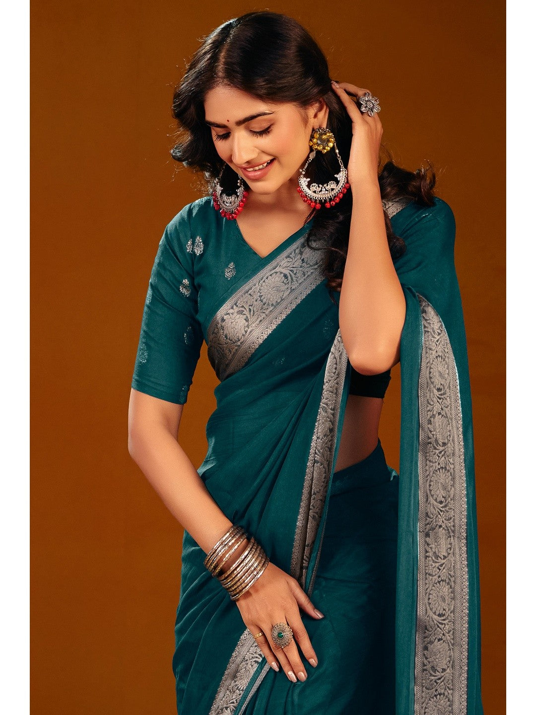 Luxurious Teal Solid Chiffon Saree Enhanced By Floral Weaving Jacquard Border - Image 3