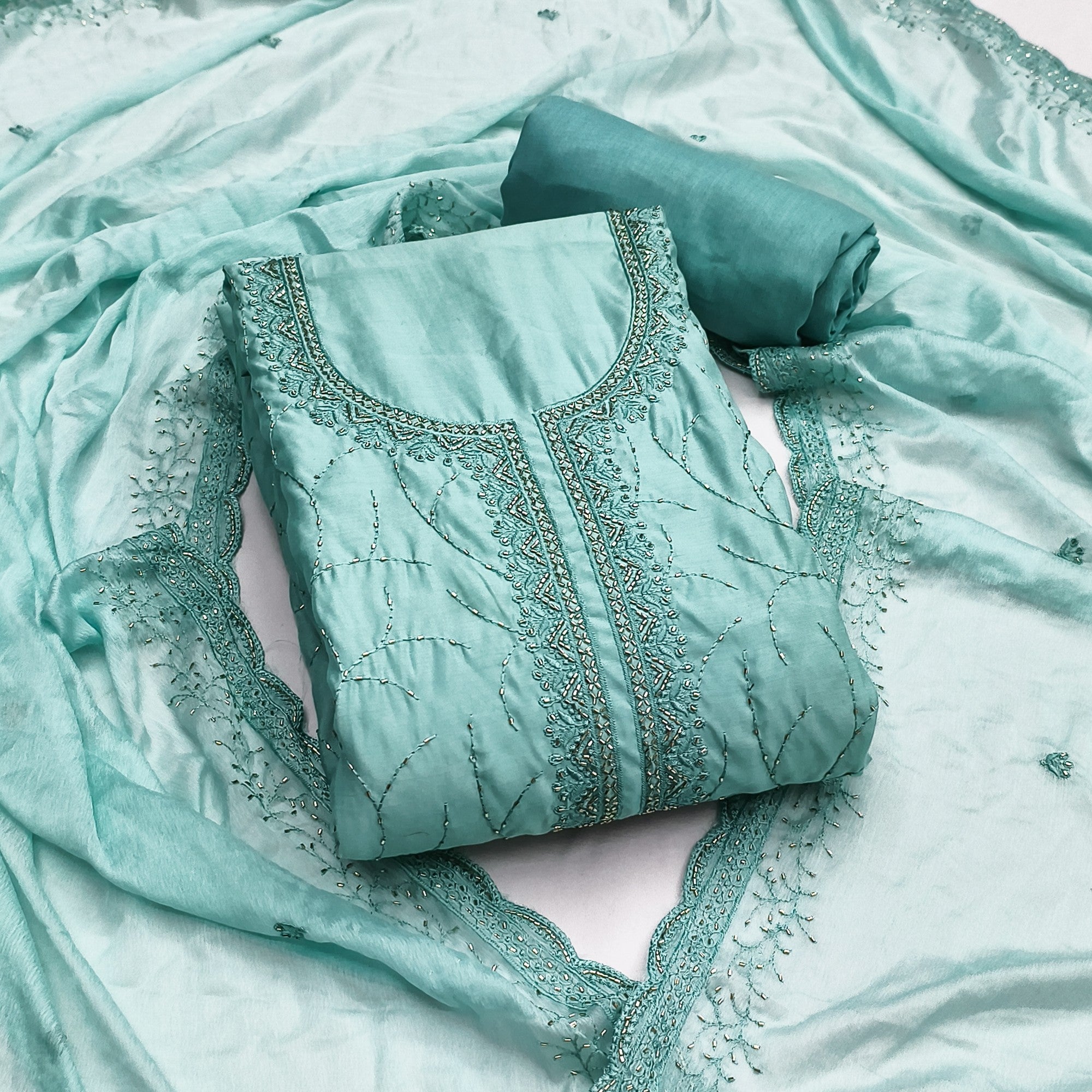 Premium Turquoise Cotton Silk Dress Material Enhanced With Delicate Thread Embroidery & Handwork - Image 1