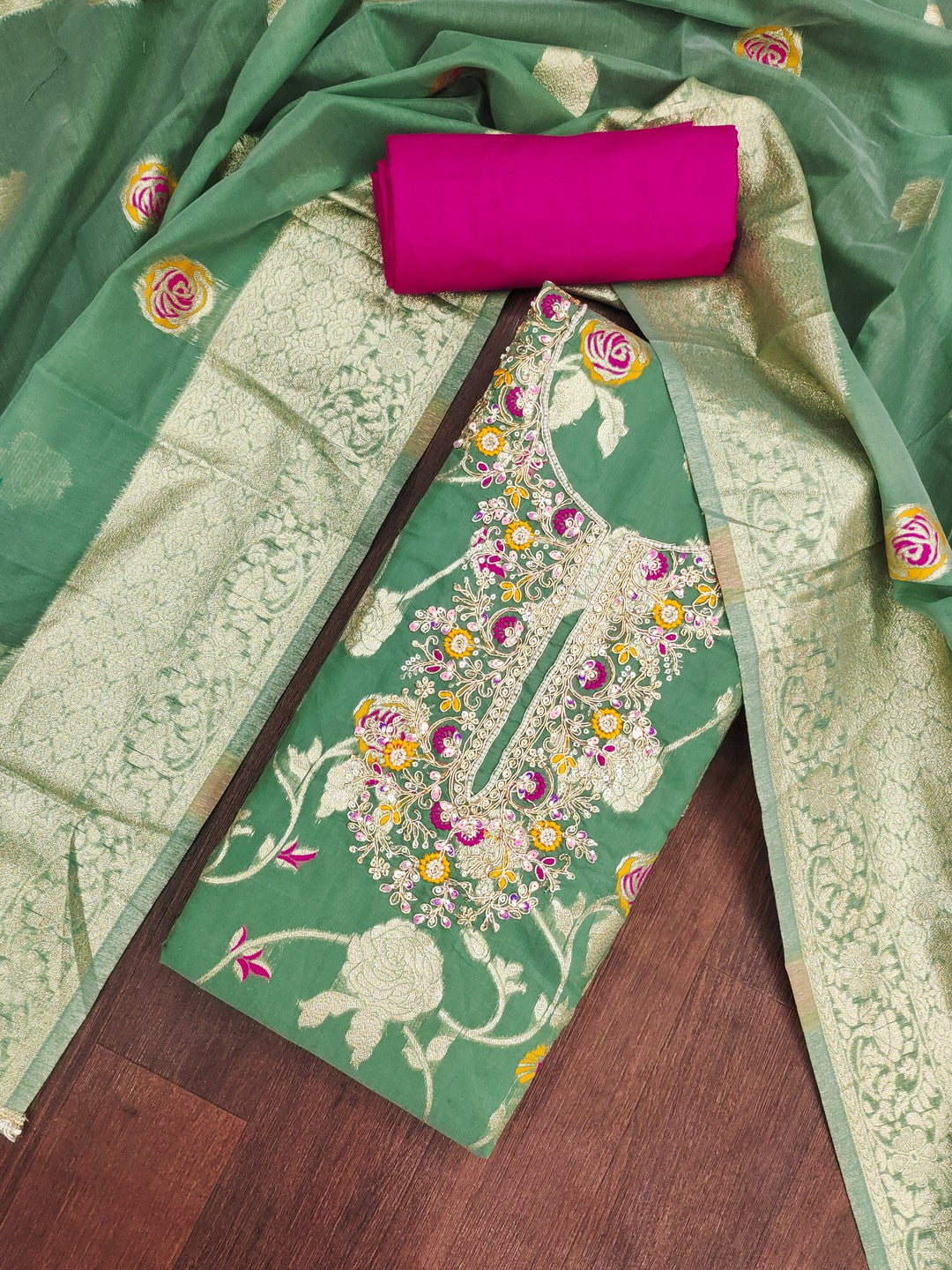 Graceful Green Floral Woven Banarasi Silk Dress Material Featuring Intricate Cording Embroidery - Image 1