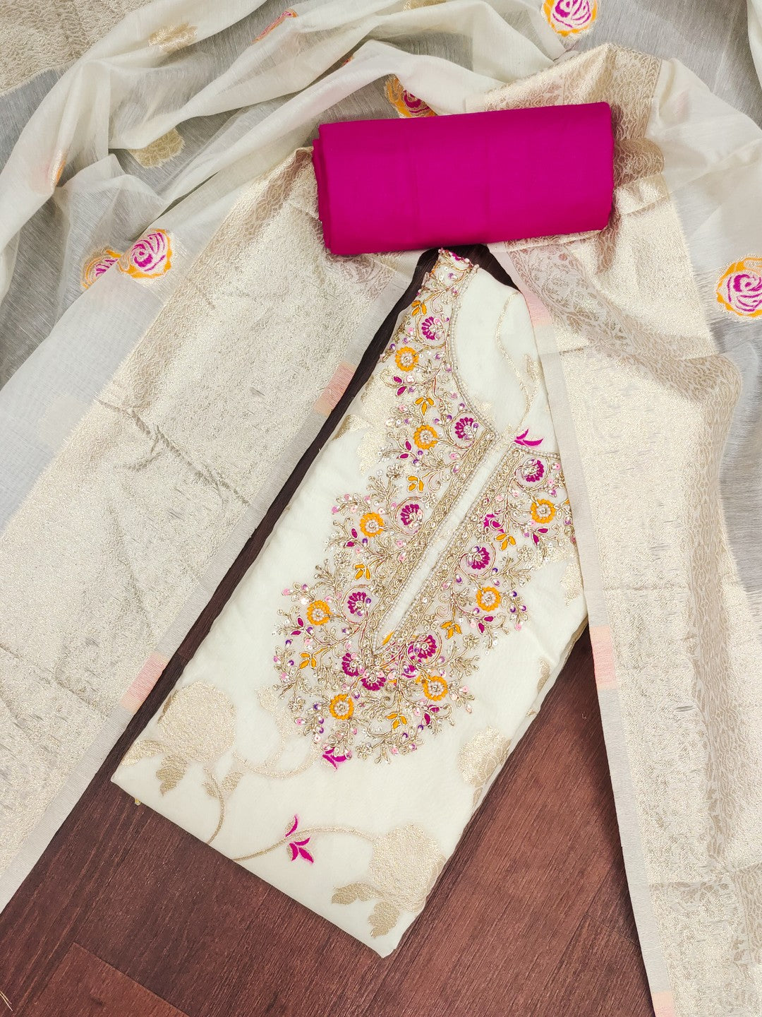 Graceful Offwhite Floral Woven Banarasi Silk Dress Material Featuring Intricate Cording Embroidery - Image 1