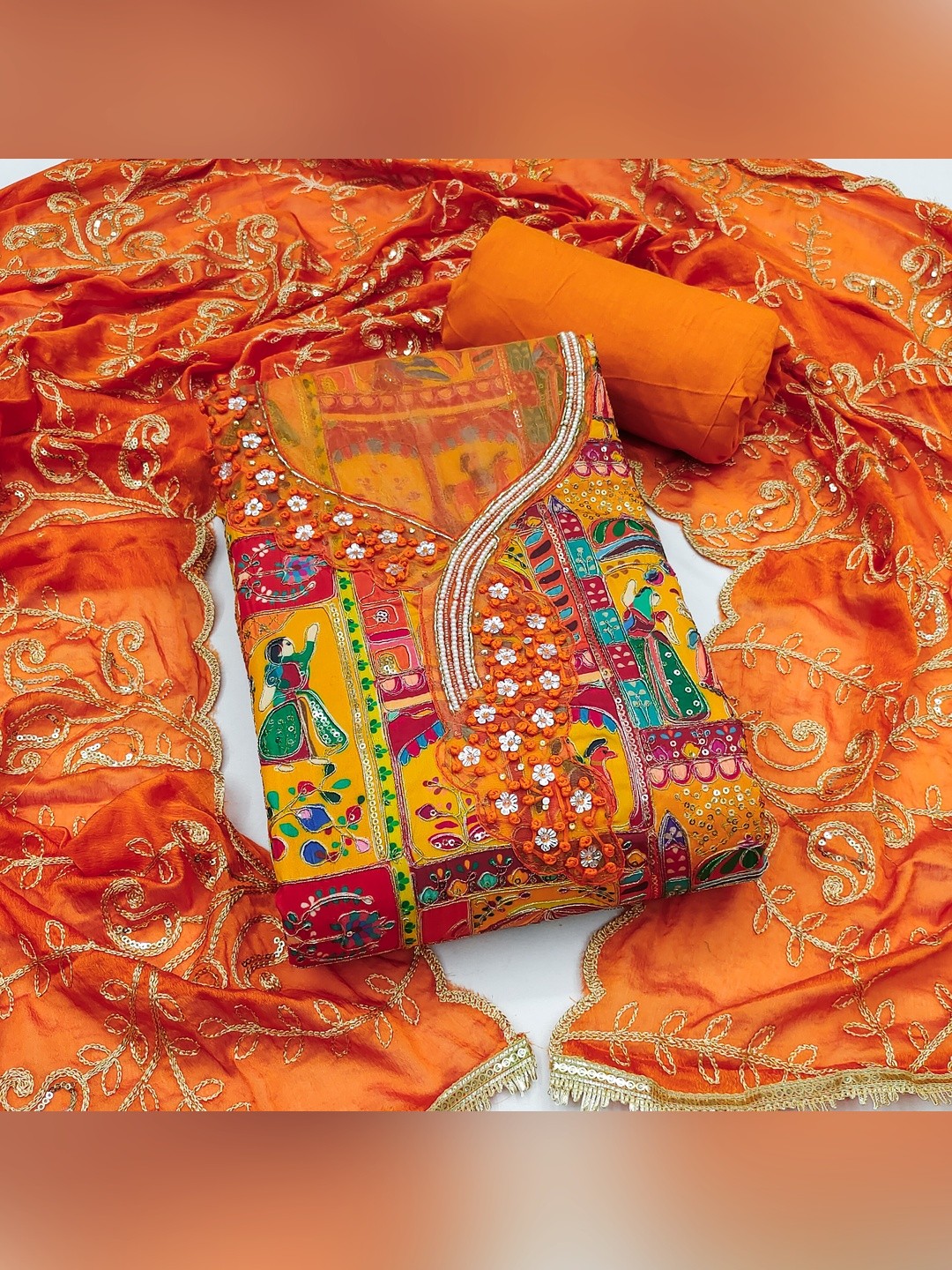 Refreshing Orange Floral Embroidered Viscose Dress Material Featuring Intricate Sequins & Moti Work - Image 1