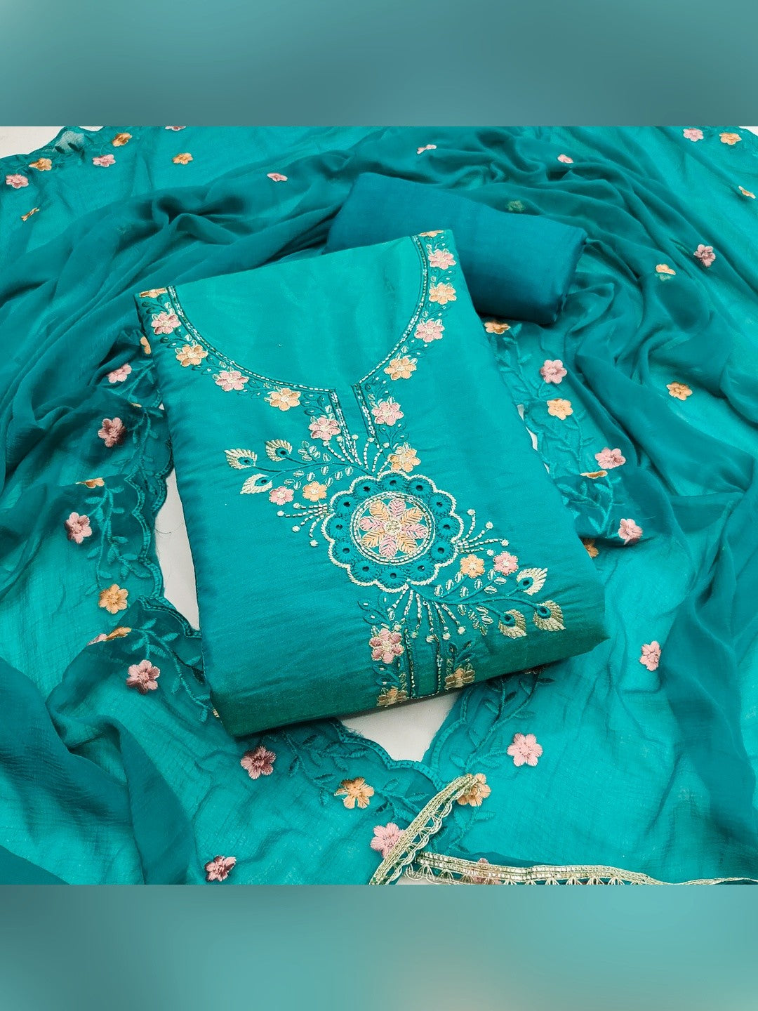 Classic Rama Blue Floral Embroidered Viscose Dress Material With Graceful Handcrafted Finishing - Image 1
