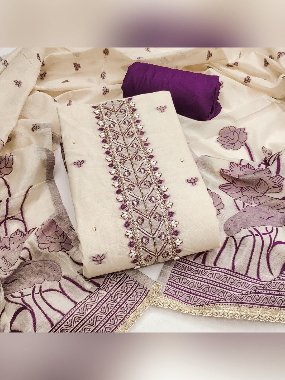 Charming Cream & Purple Floral Weaving Banarasi Silk Dress Material Showcasing Refined Moti Handwork - Image 1