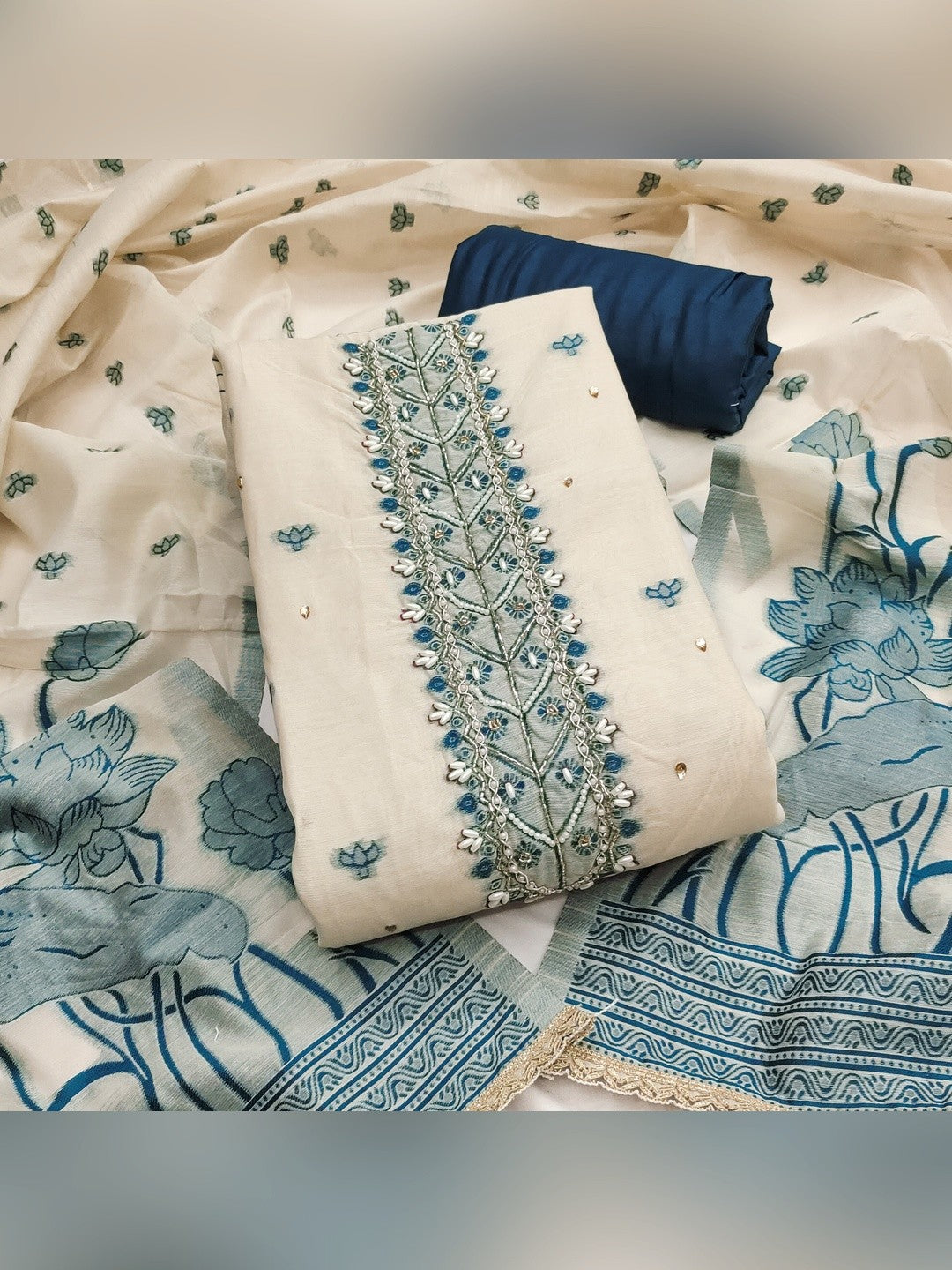 Charming Cream & Blue Floral Weaving Banarasi Silk Dress Material Showcasing Refined Moti Handwork - Image 1