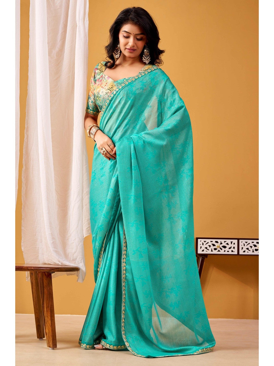Radiant Turquoise Foil Printed Chiffon Saree Accented With Elegant Sequins Embroidered Border Work - Image 1