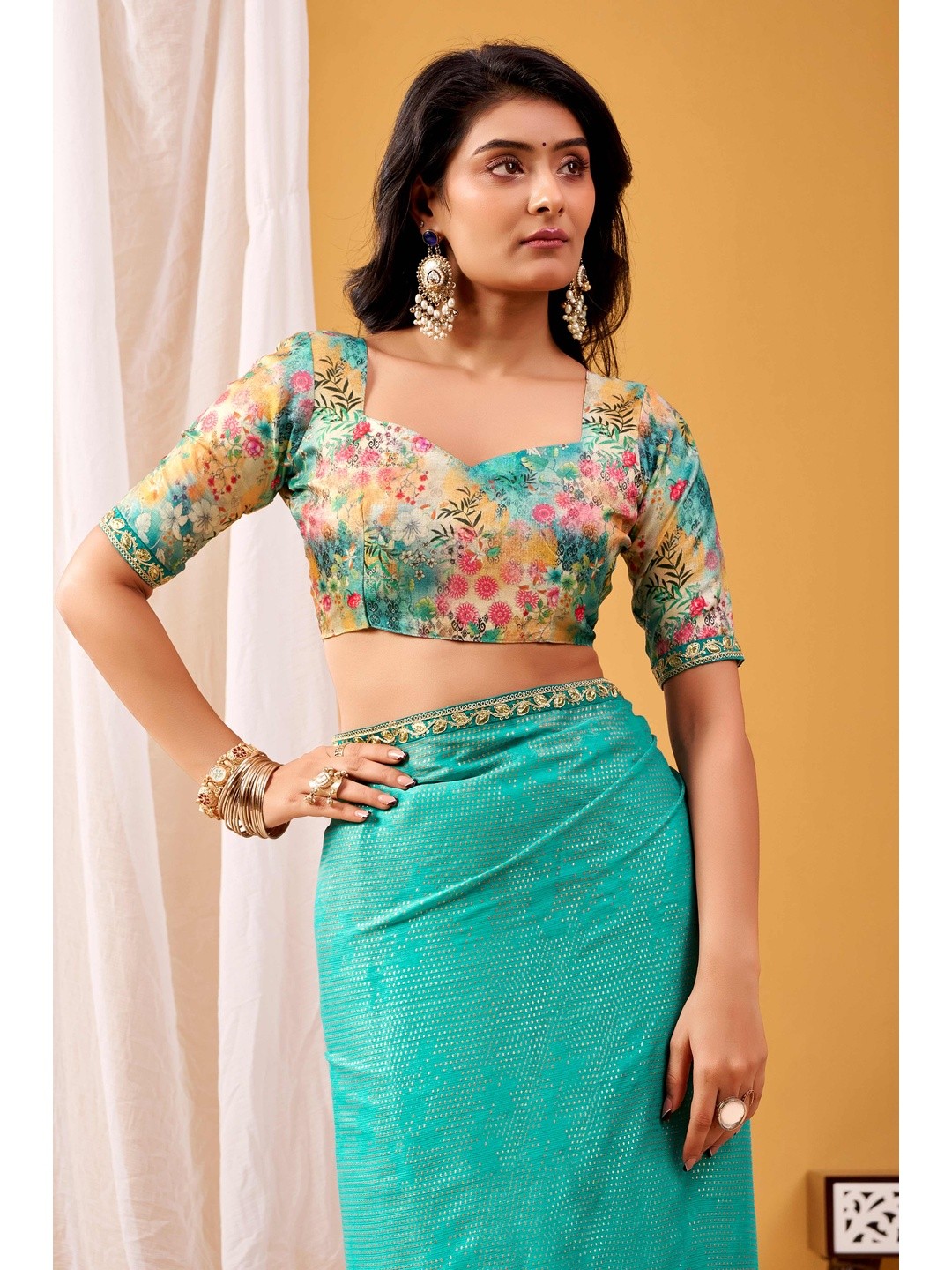 Radiant Turquoise Foil Printed Chiffon Saree Accented With Elegant Sequins Embroidered Border Work - Image 2