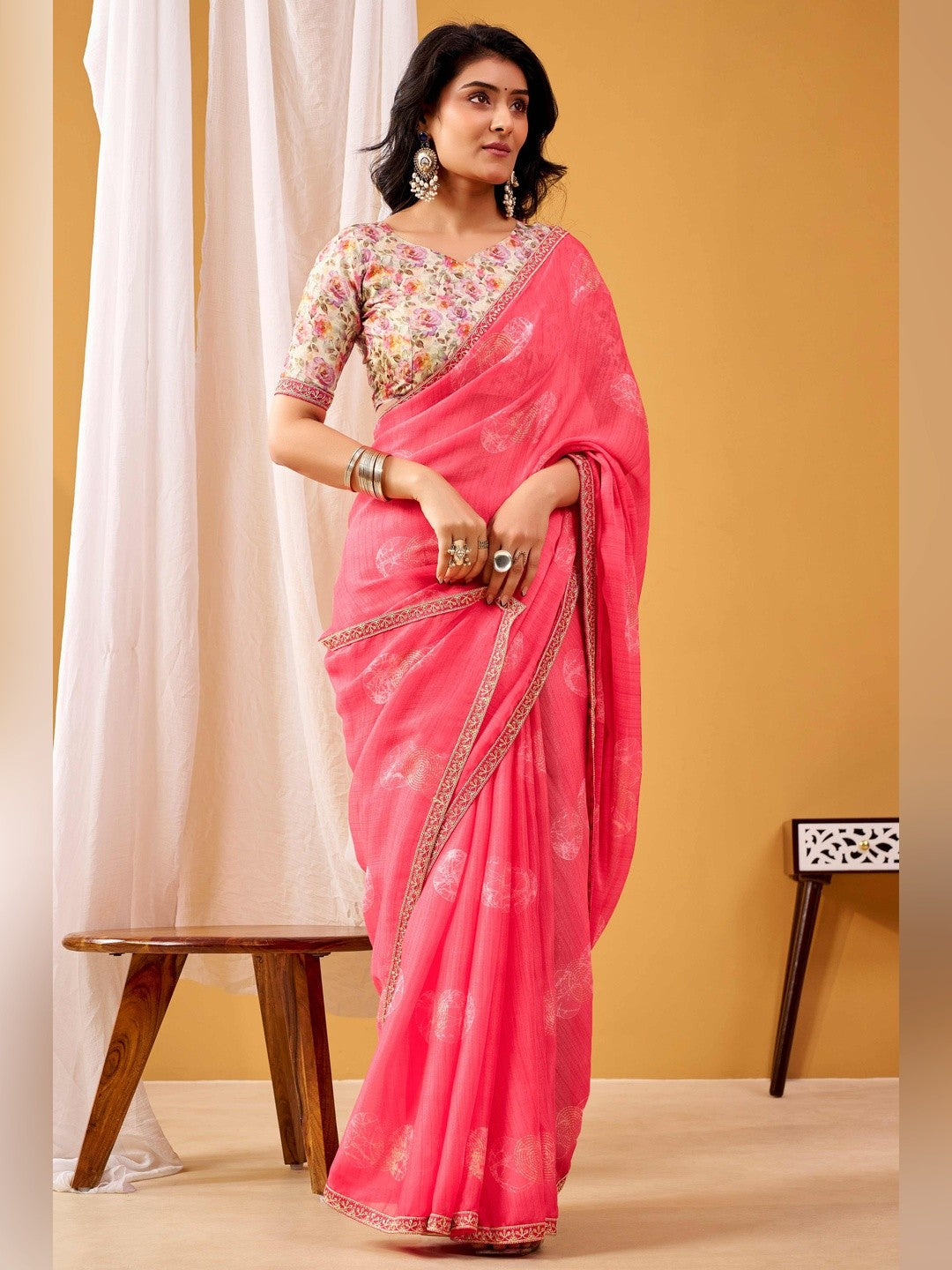 Charming Pink Foil Printed Chiffon Saree With Intricate Sequins Embroidered Border Finish - Image 1