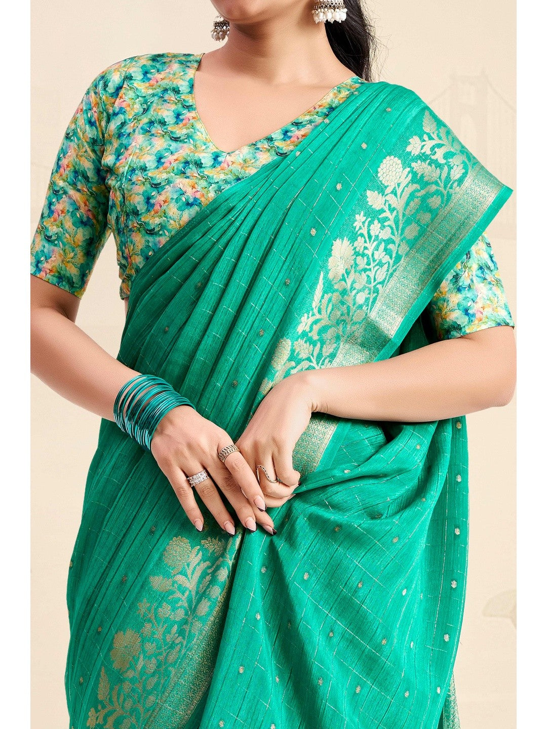 Refreshing Rama Green Floral Weaving Chinon Jacquard Saree With Artful Tassel Pallu Accent - Image 4