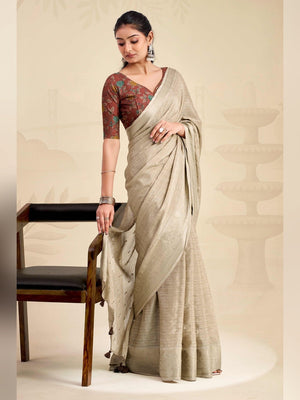 Refreshing Chikoo Floral Weaving Chinon Jacquard Saree With Artful Tassel Pallu Accent - Image 2
