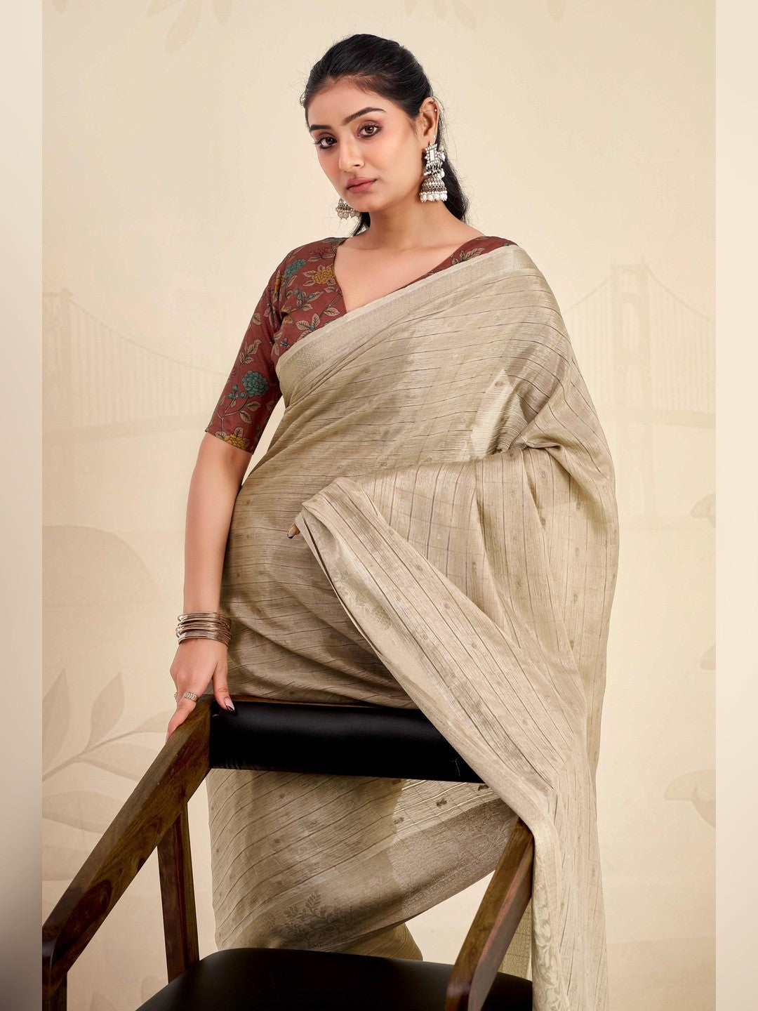 Refreshing Chikoo Floral Weaving Chinon Jacquard Saree With Artful Tassel Pallu Accent - Image 5