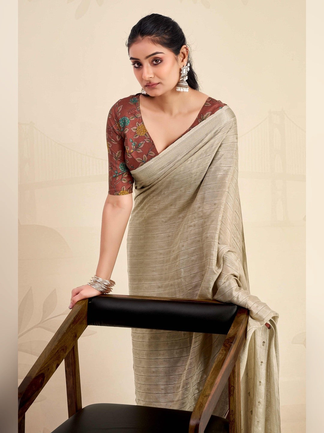 Refreshing Chikoo Floral Weaving Chinon Jacquard Saree With Artful Tassel Pallu Accent - Image 6