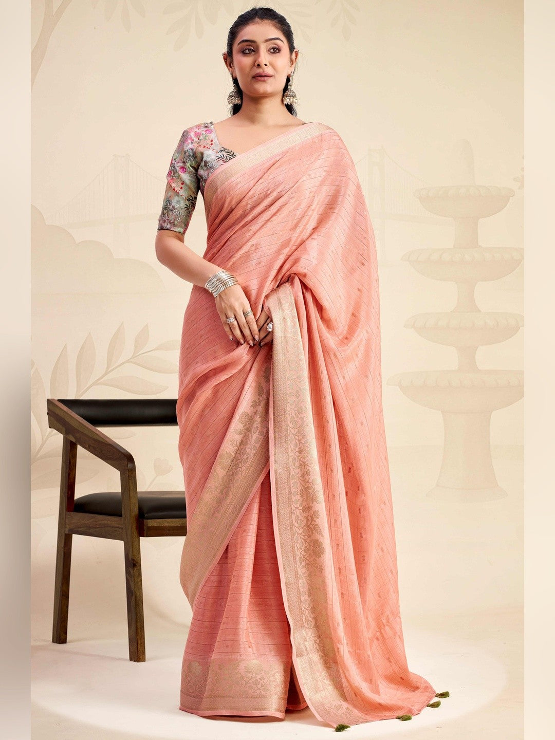 Refreshing Peach Floral Weaving Chinon Jacquard Saree With Artful Tassel Pallu Accent - Image 1