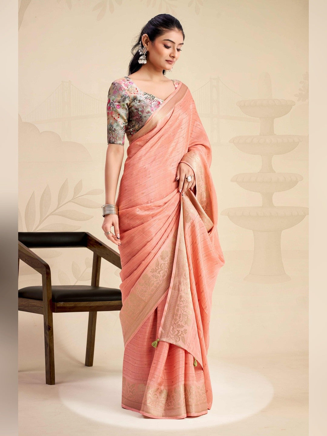 Refreshing Peach Floral Weaving Chinon Jacquard Saree With Artful Tassel Pallu Accent - Image 3