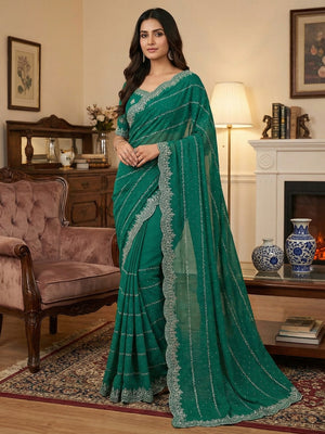 Timeless Rama Green Georgette Saree with Detailed Embroidery & Elegant Swarovski Embellishments - Image 1
