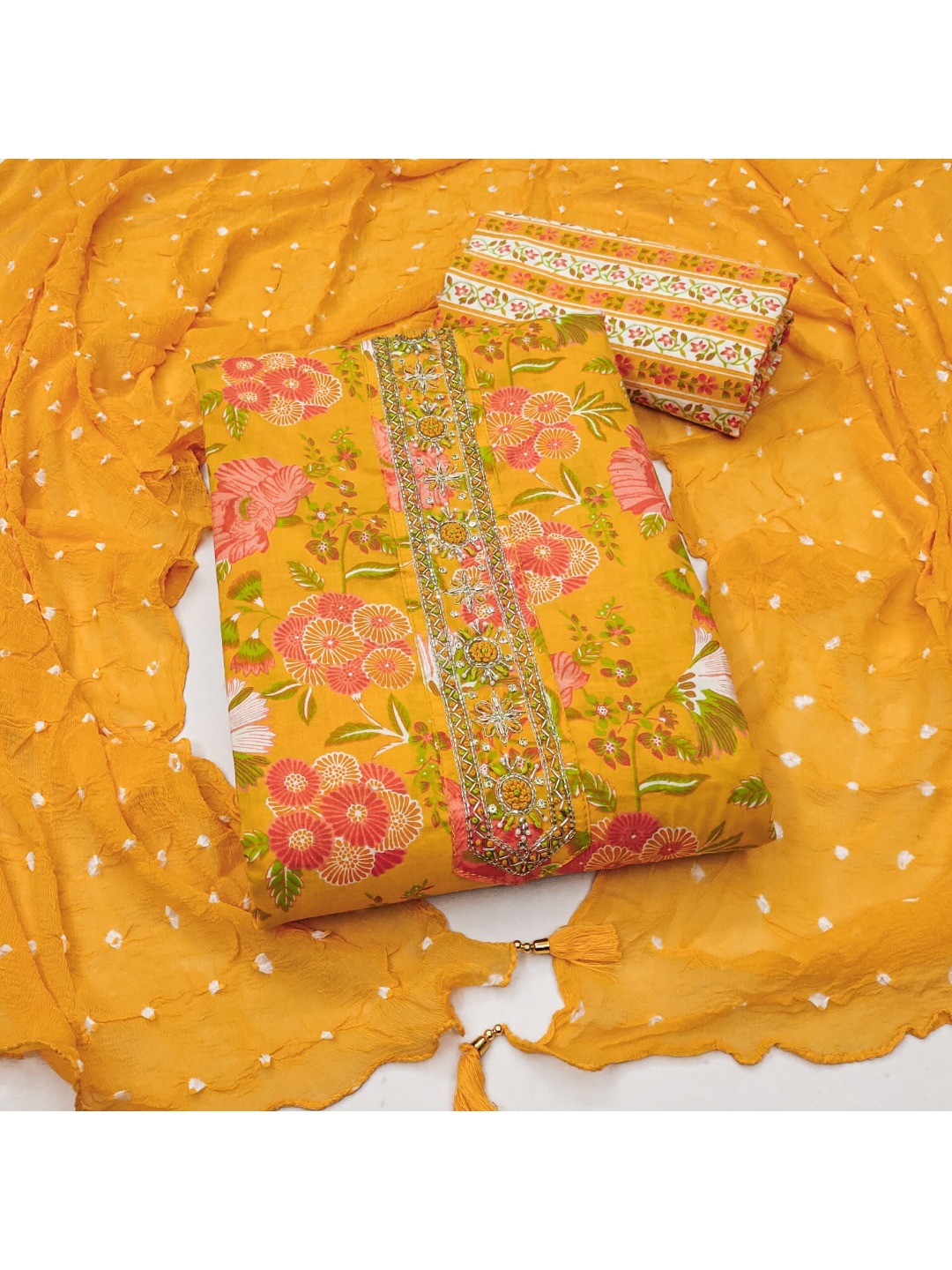 Stylish Mustard Floral Printed Pure Cotton Dress Material With Elegant Embroidered Neckline - Image 1
