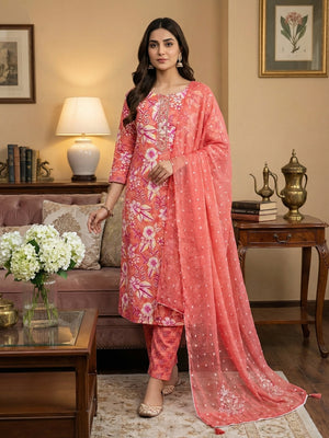 Stylish Coral Pink Floral Printed Pure Cotton Dress Material With Elegant Embroidered Neckline - Image 1