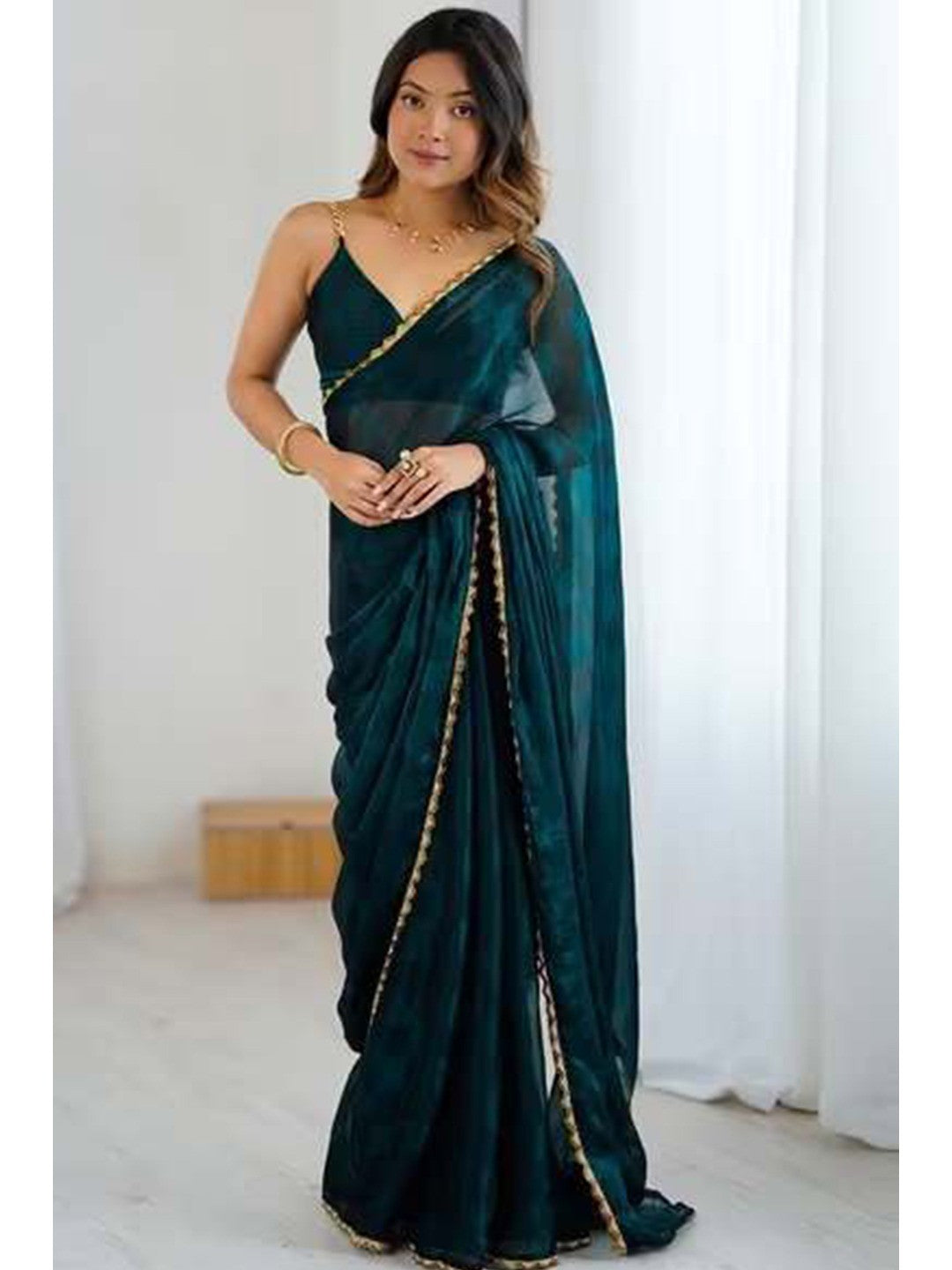 Teal Printed Satin Partywear Saree Enhanced with Elegant Lace Border - Image 1