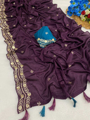 Charming Wine Georgette Saree Enhanced With Intricate Floral Sequins Embroidery - Image 1