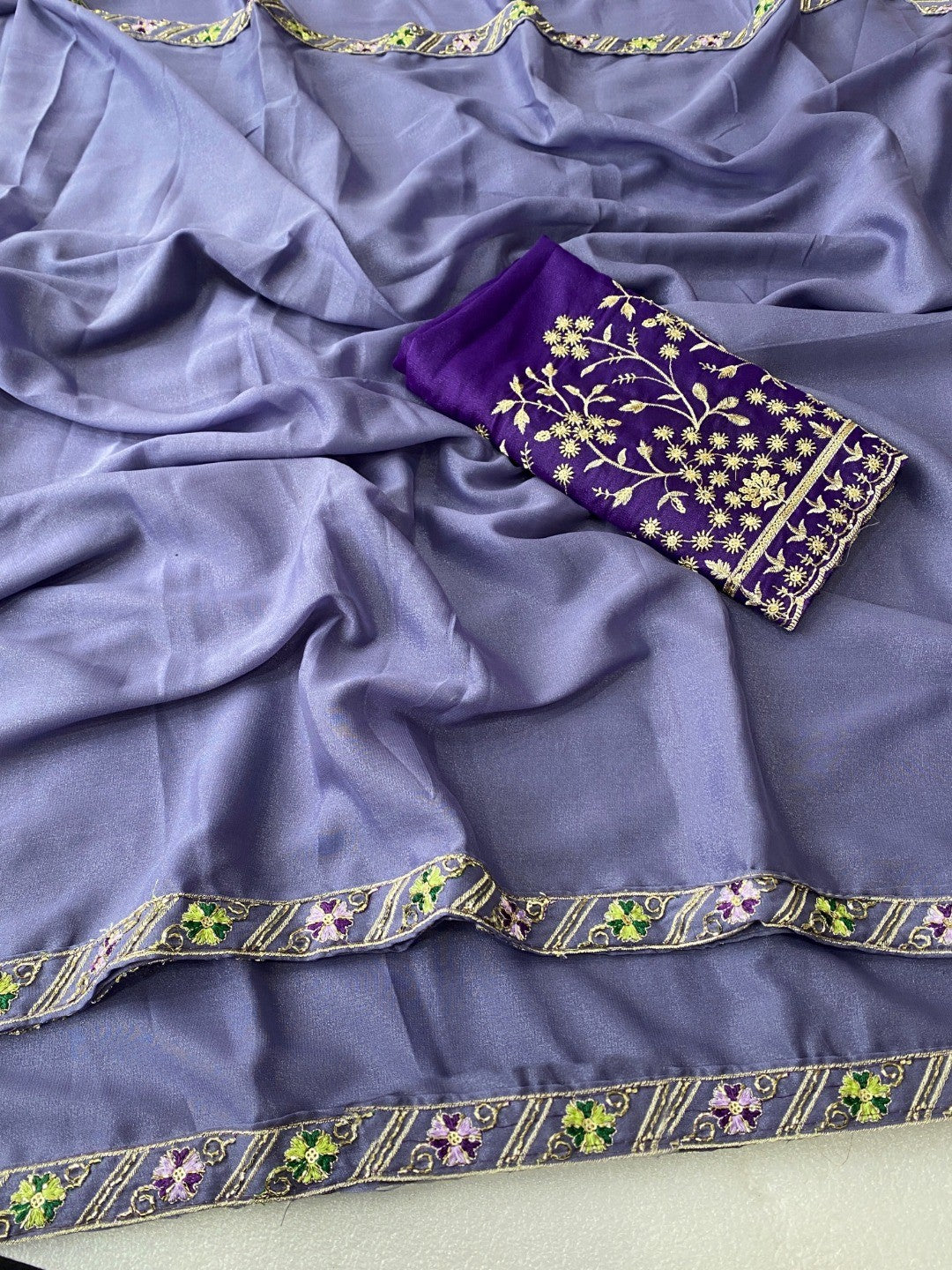 Timeless Lavender Solid Georgette Saree Finished With Graceful Floral Hand Embroidered Lace Border - Image 4