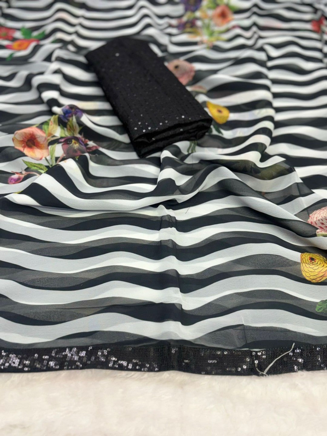 Black Georgette Saree Featuring Delicate Striped Patterns and a Sequin Embellished Border - Image 2