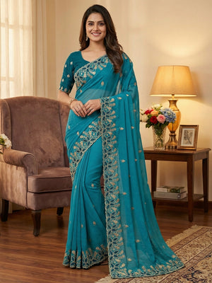 Vibrant Blue Georgette Saree Adorned With Elegant Floral Embroidery Work - Image 1