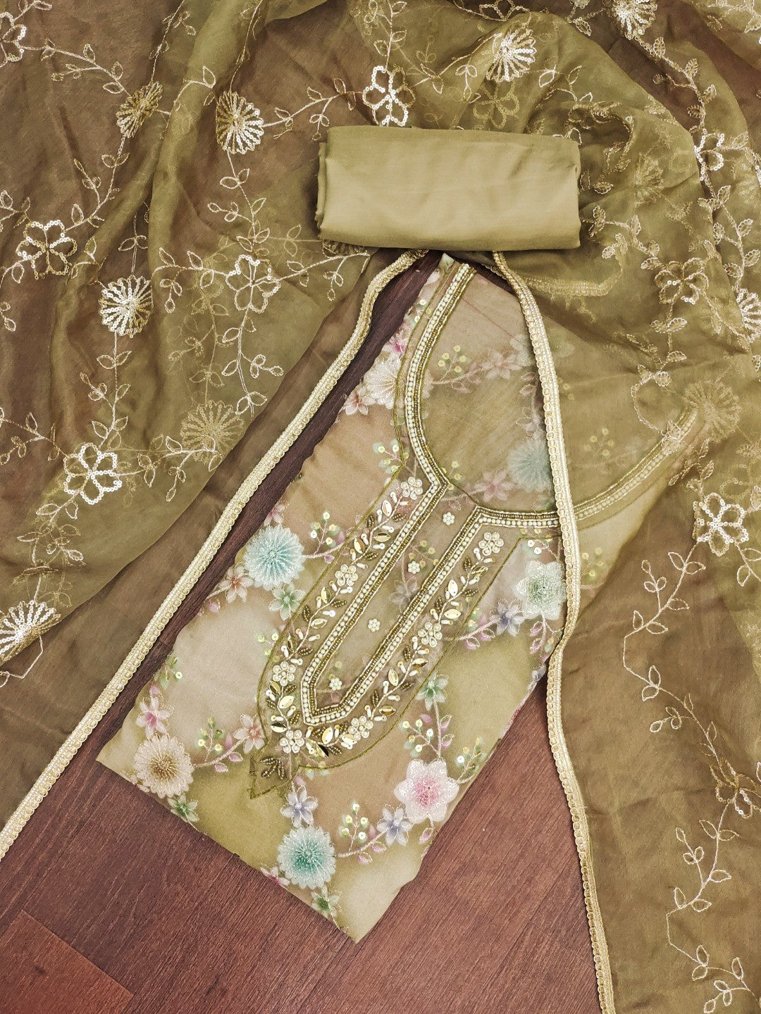 Sophisticated Green Floral Print Organza Dress Material With Sequins Embroidery & Moti Handwork - Image 1