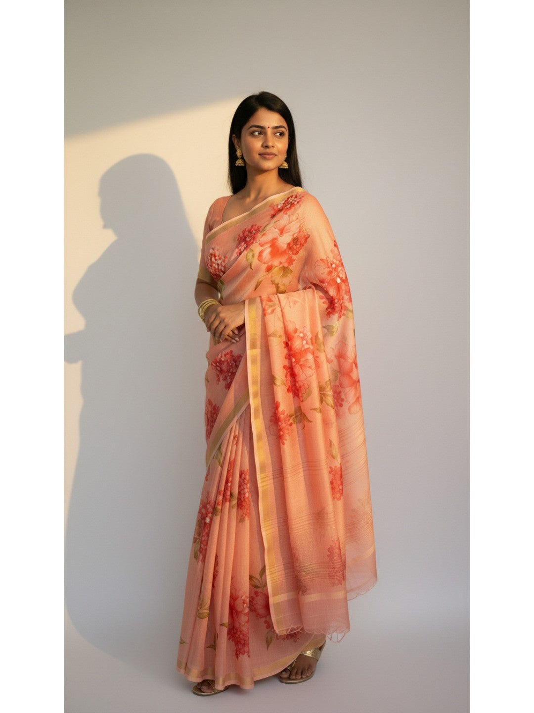 Charming Peach Floral Printed Chanderi Cotton Saree Highlighted By Intricate Zari Border Work - Image 1