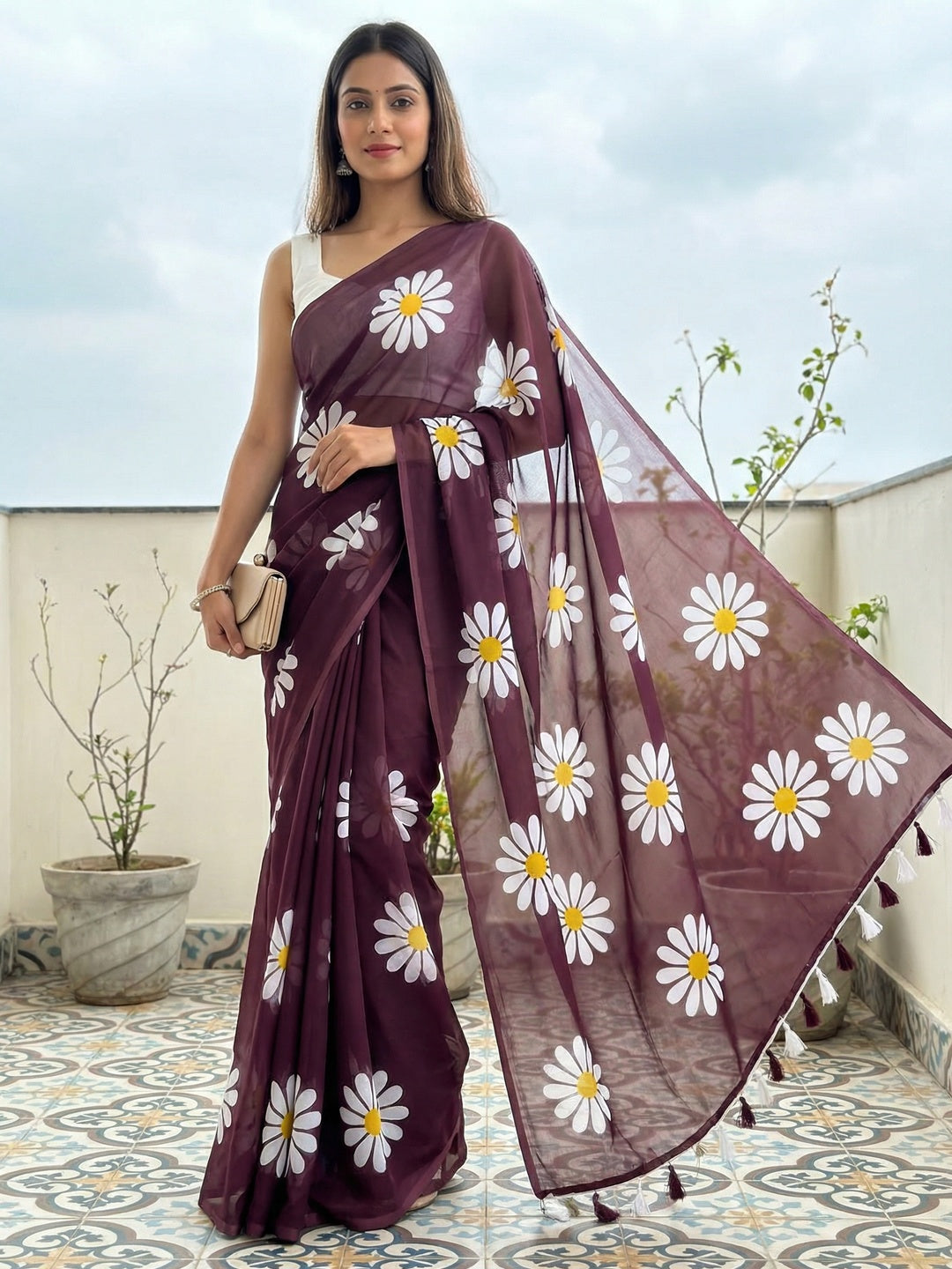 Wine Georgette Saree Featuring Delicate Floral Prints & Tassels Pallu - Image 1