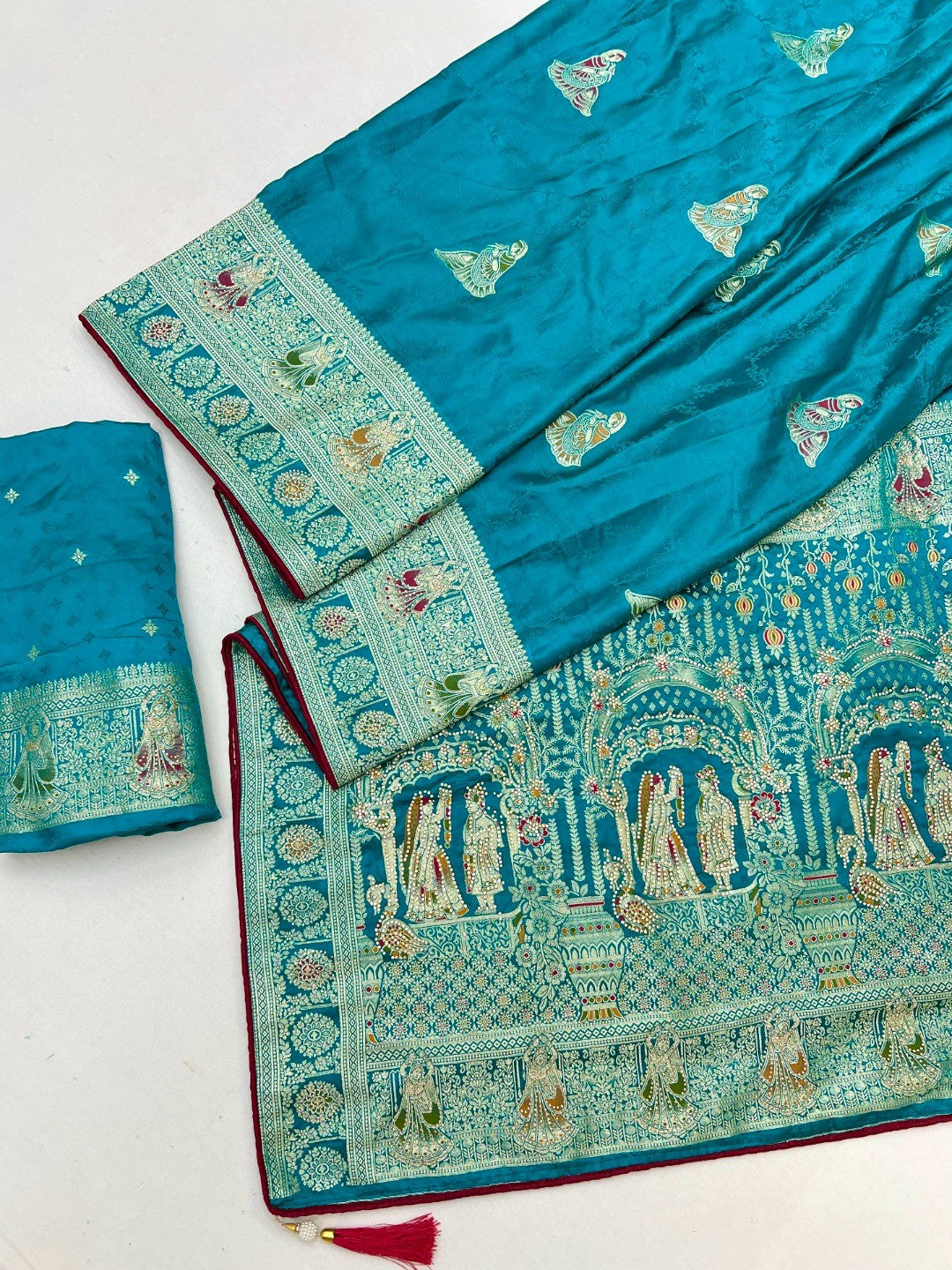 Luxurious Peacock Blue Satin Saree With Artistic Weaving Design & Gleaming Stone Work Accents - Image 2
