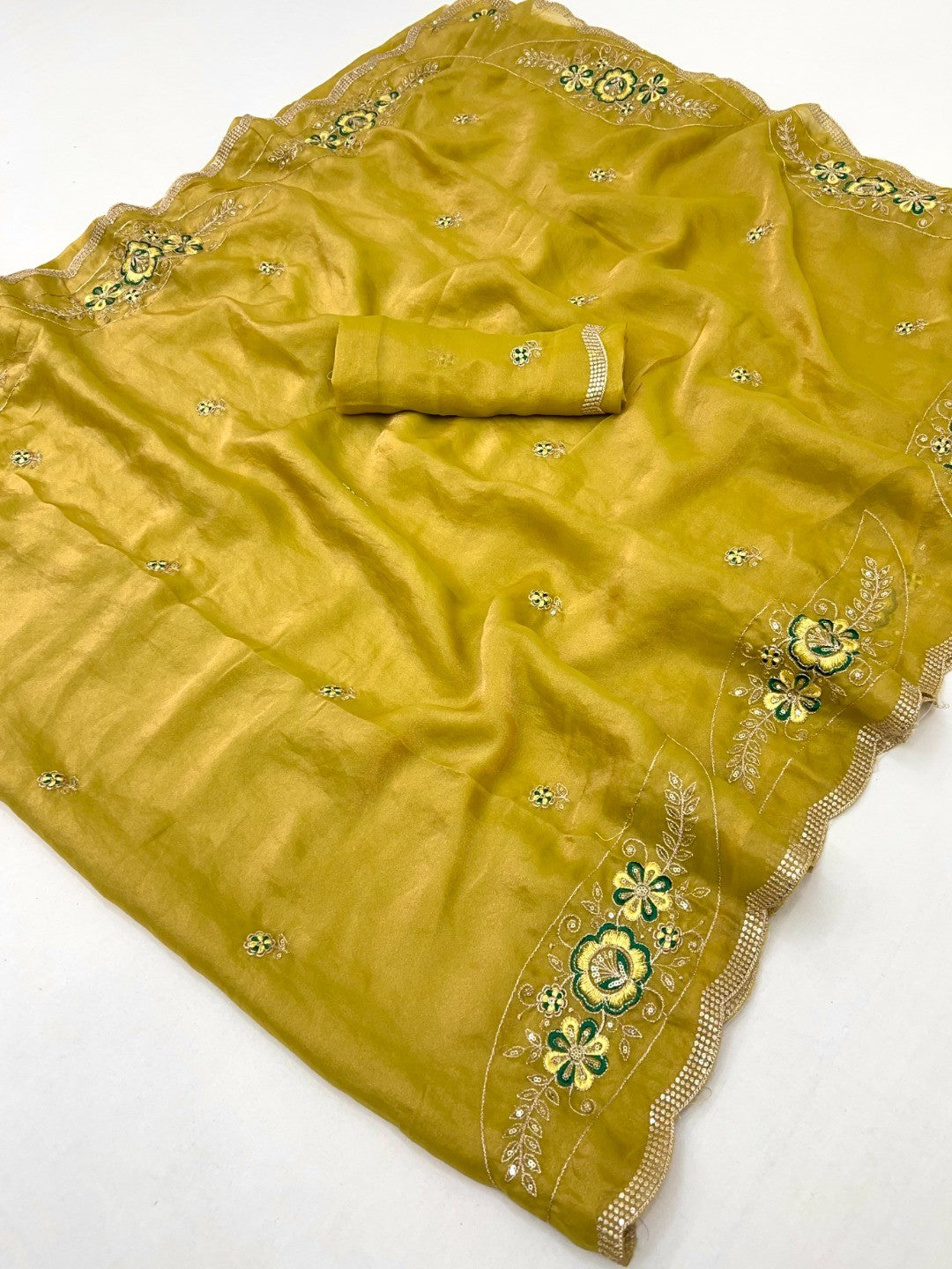 Luxurious Dark Mustard Floral Sequins Embroidered Moss Georgette Saree Accented With Zari Border - Image 2