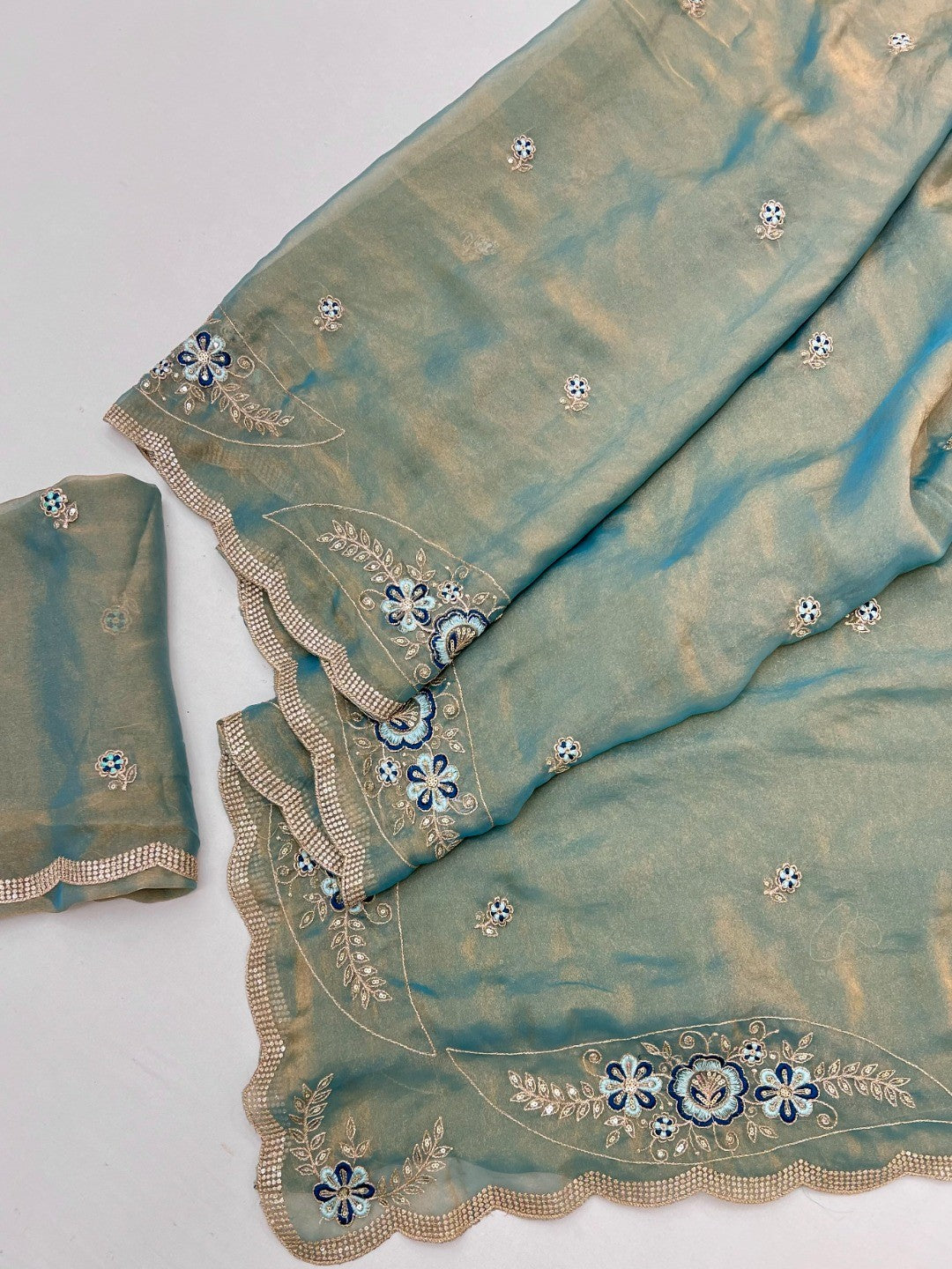 Luxurious Blue Floral Sequins Embroidered Moss Georgette Saree Accented With Zari Border - Image 3
