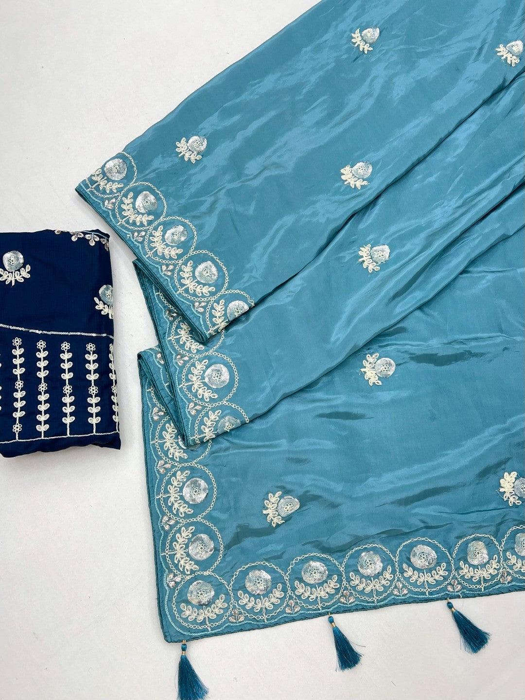 Luxurious Blue Crepe Saree Featuring Floral Sequins Embroidery & Designer Tassel Pallu - Image 2