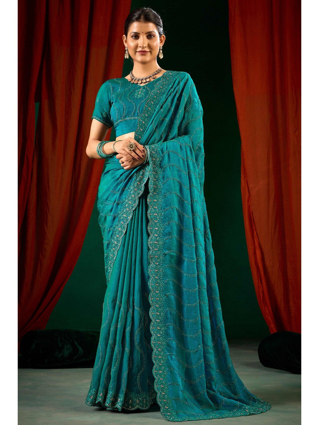 Graceful Teal Green Georgette Silk Saree with Delicate Embroidery - Image 1