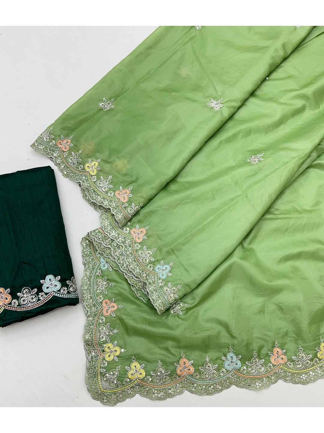 Elite Designer Green Crystal Tissue Saree Showcasing Floral Embroidery & Sequins Detailing - Image 3