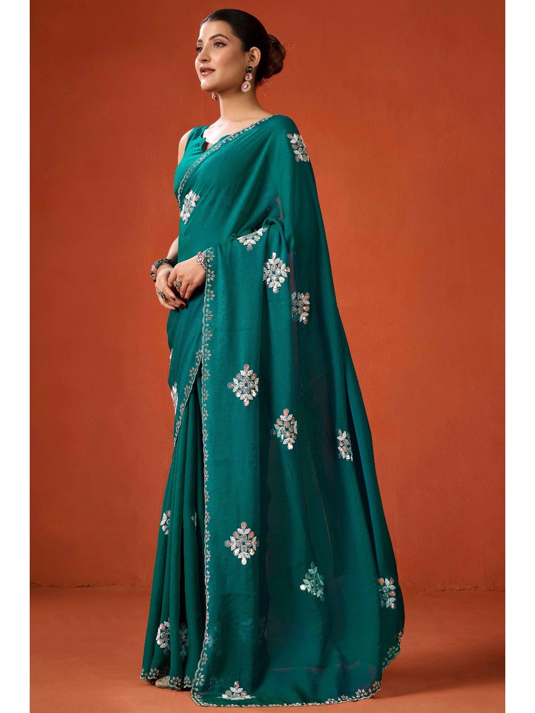 Graceful Teal Green Georgette Silk Saree Adorned with Floral Embellishments - Image 5